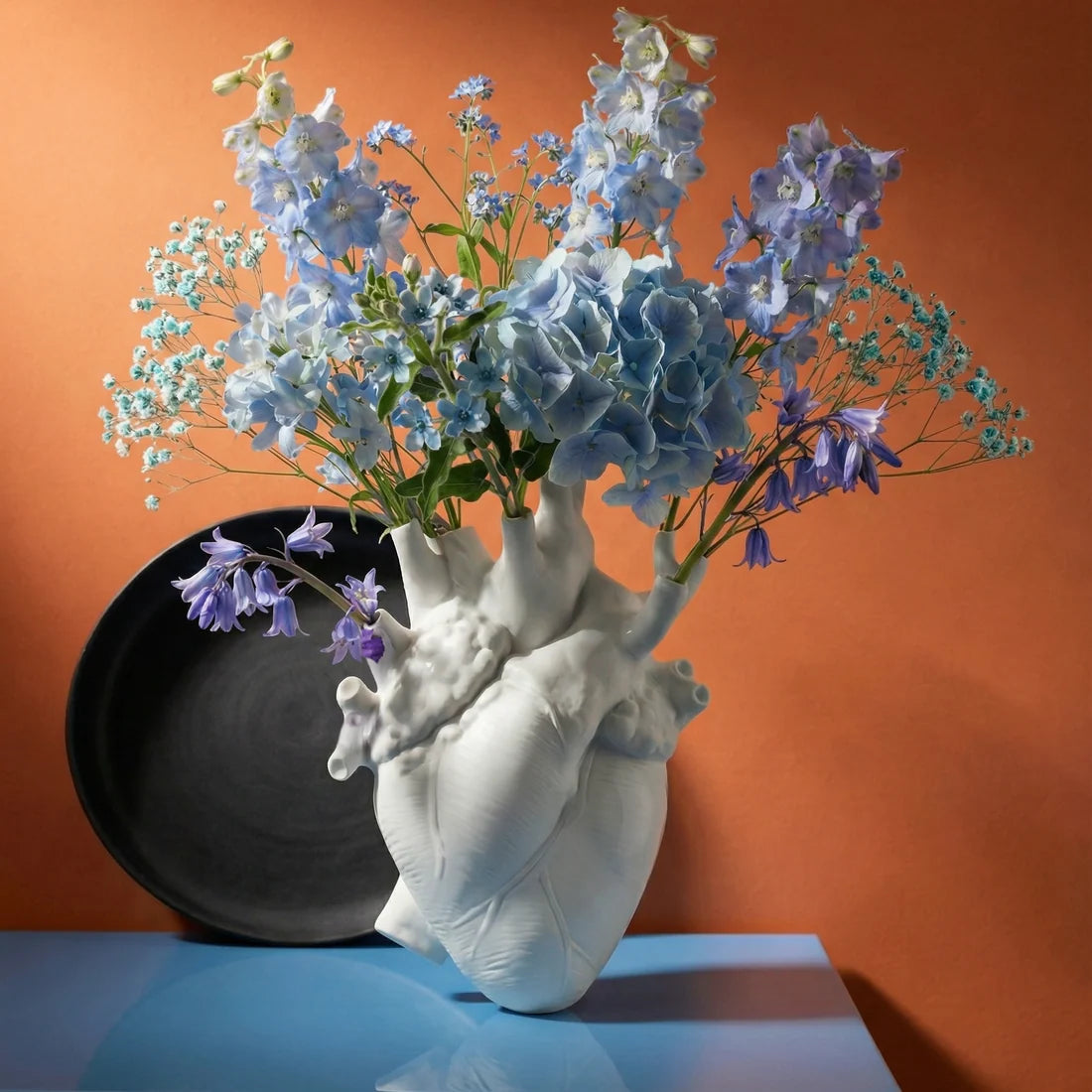Porcelain vase love in bloom white