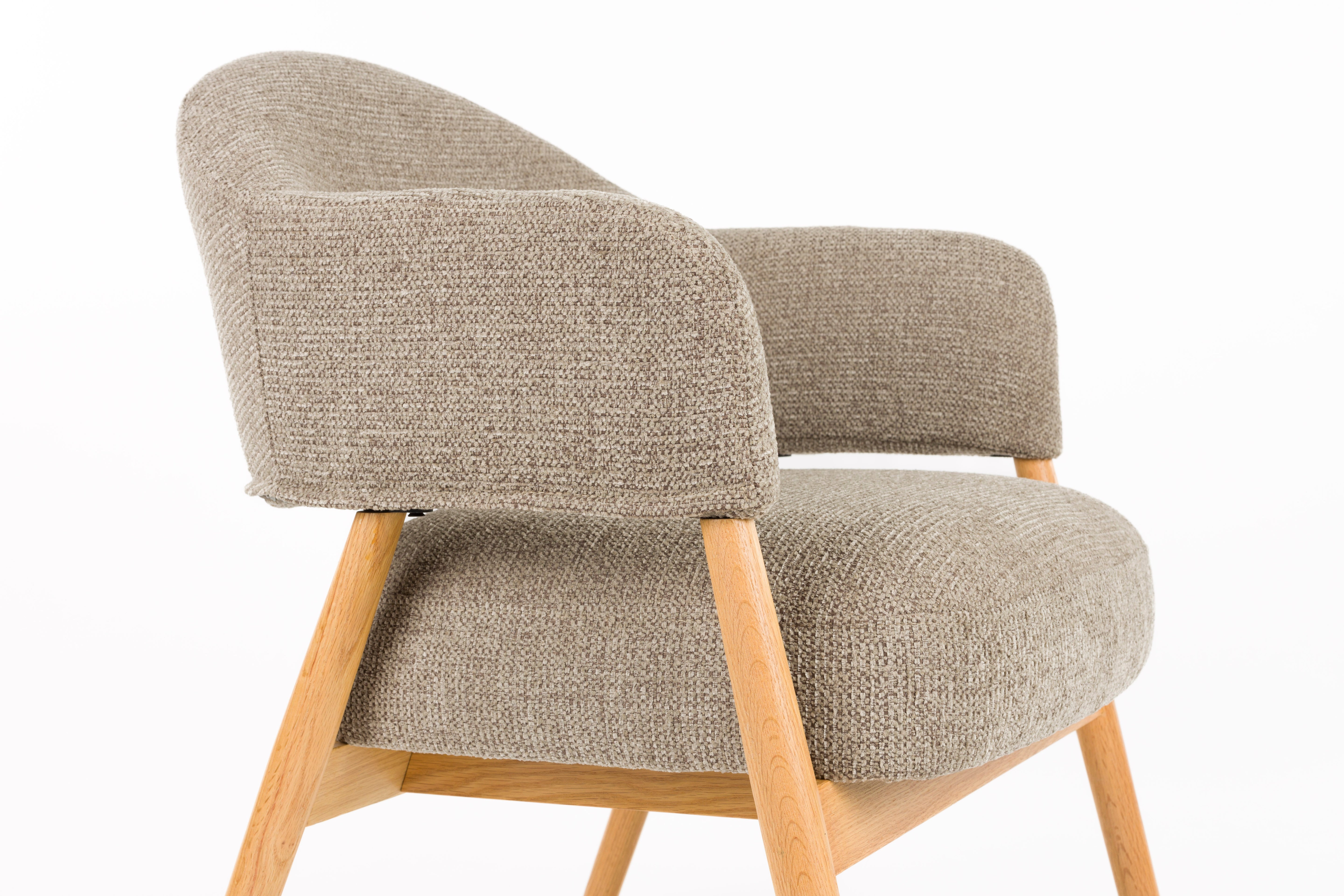 INDY brown armchair with wooden base