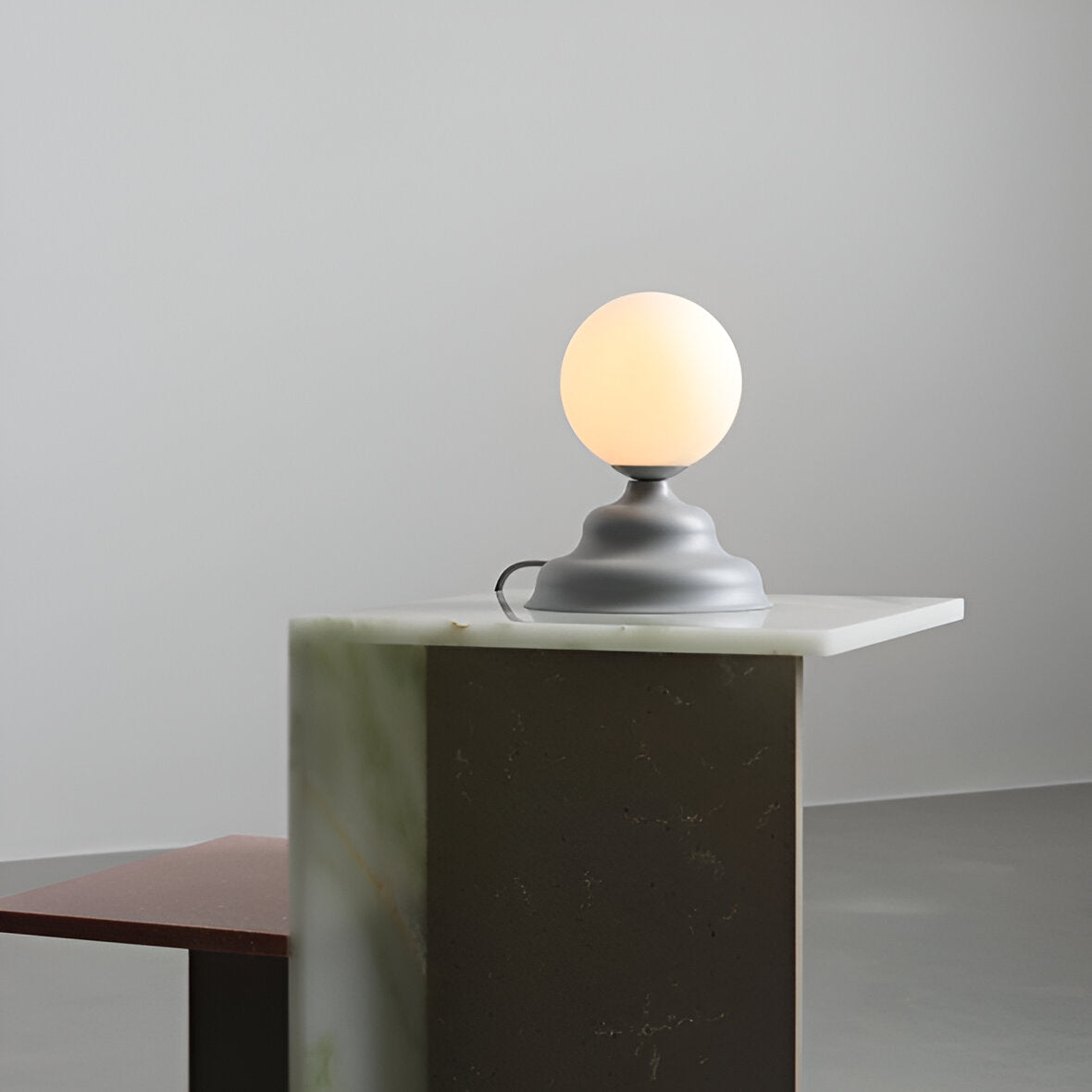 Table lamp with a glass lampshade gray wave