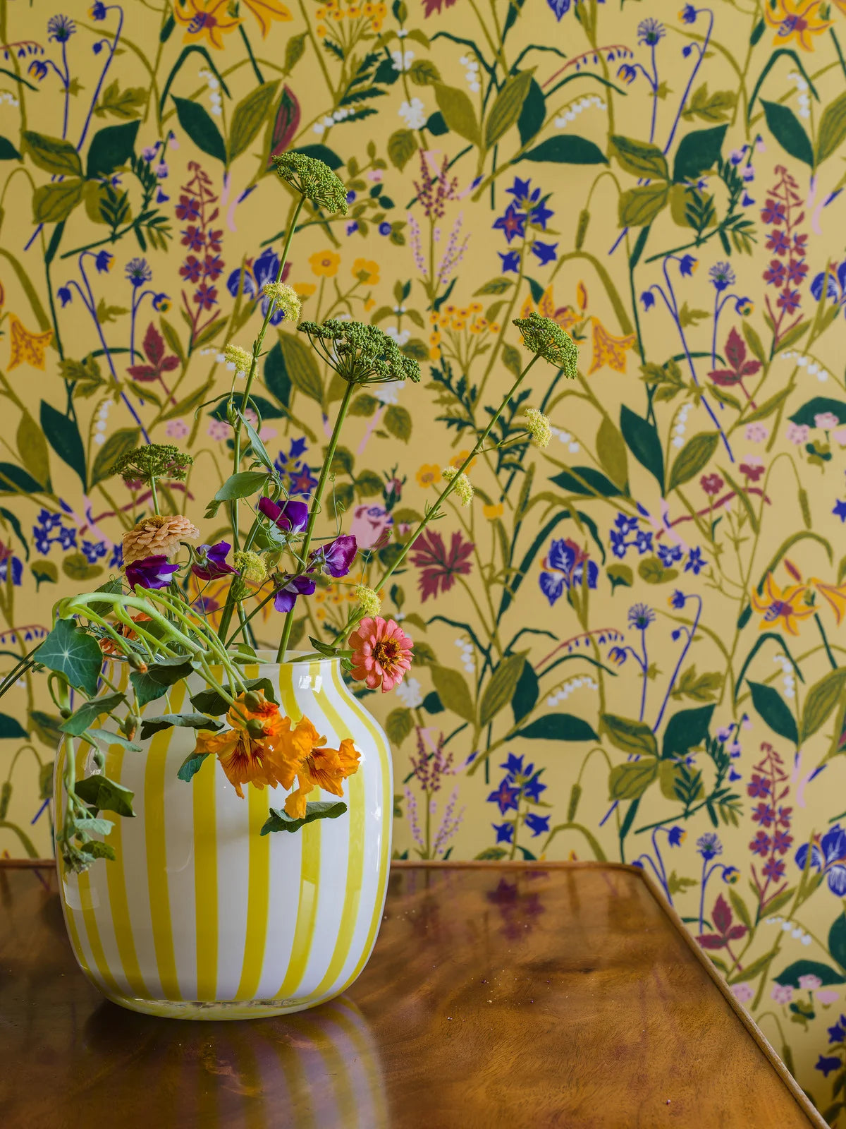 Wallpaper with a floral plant motif ROS OCH LILJA yellow