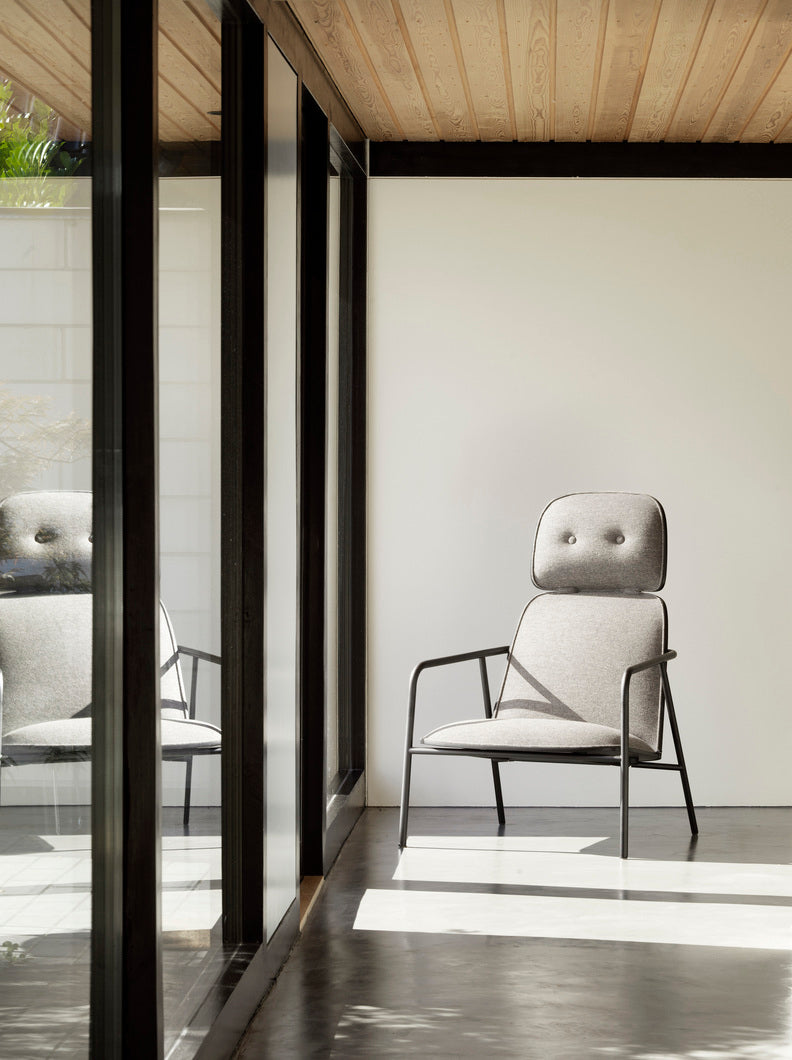 PAD armchair high black ash veneer with a black base