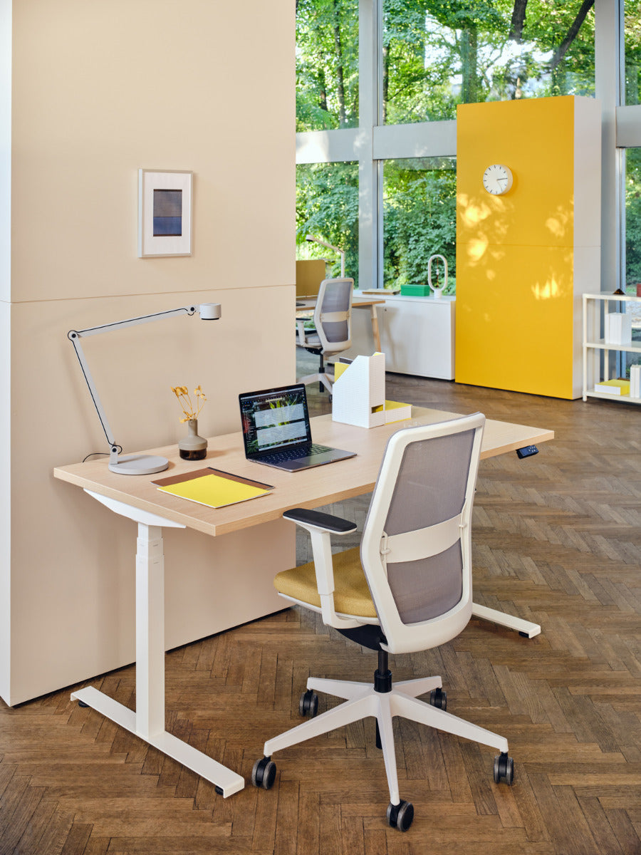 Armchair with an openwork EVO backrest adjustable base with wheels to the soft surface