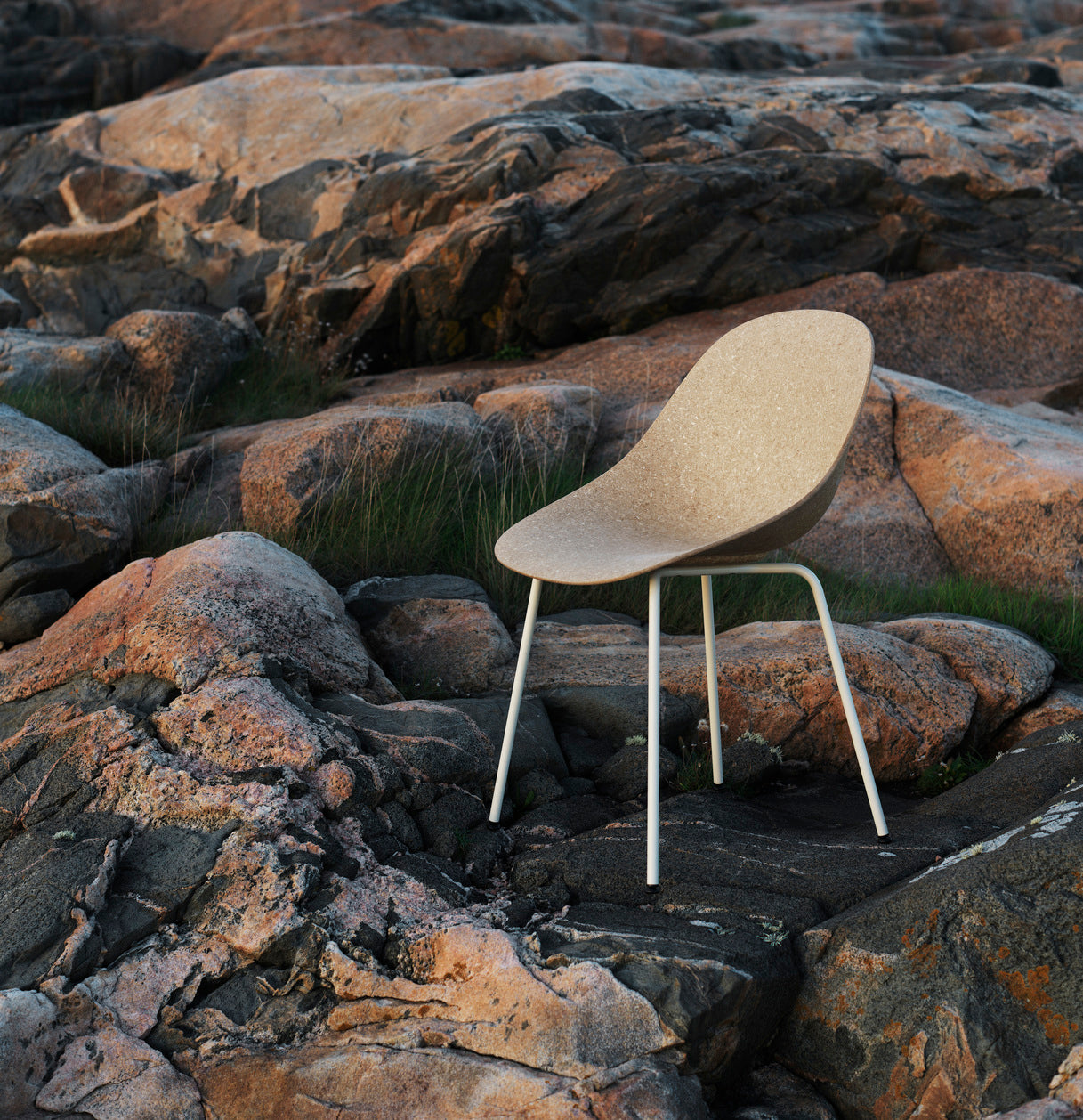 A beige mat chair with a black base