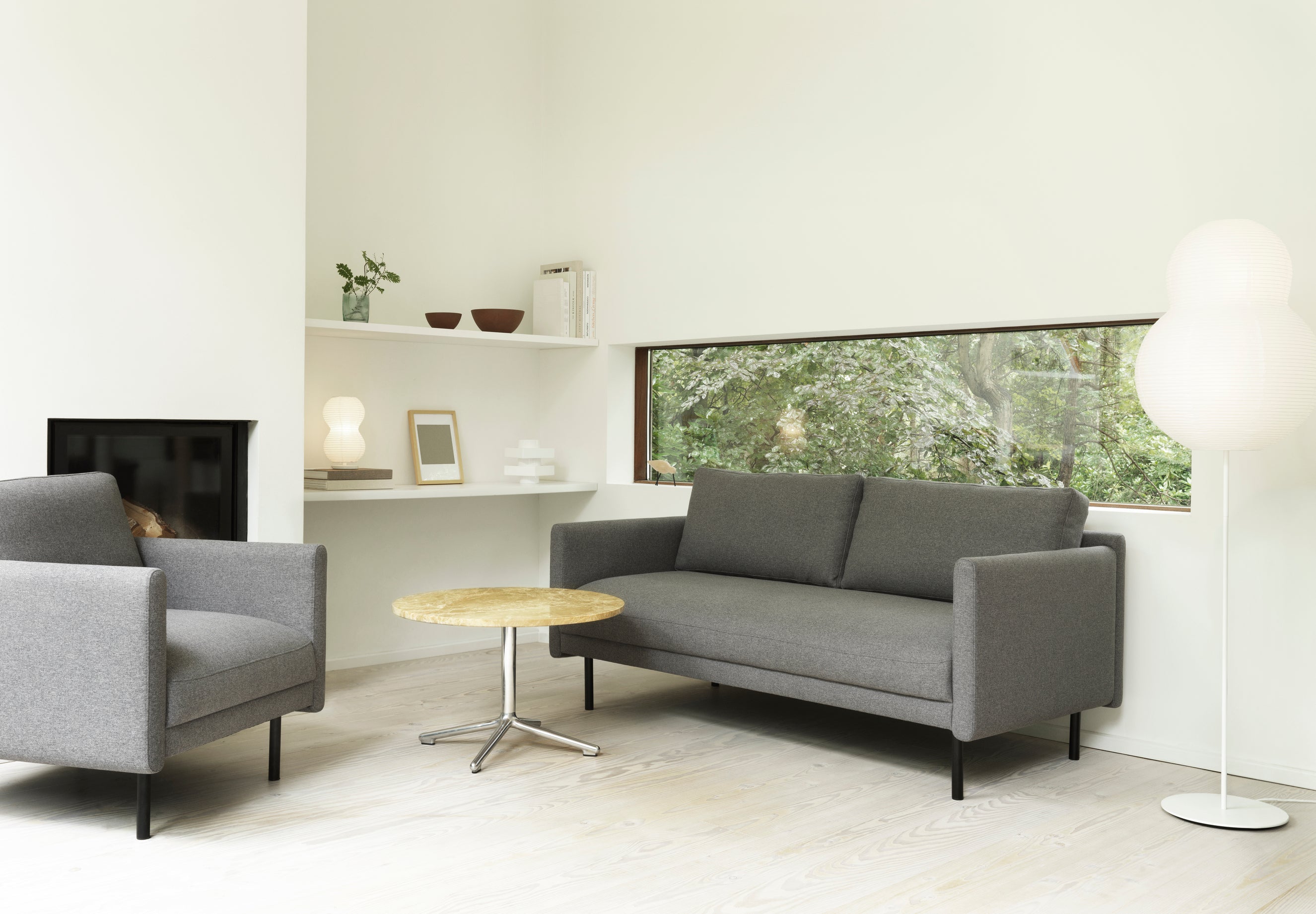 White rar armchair with a black base