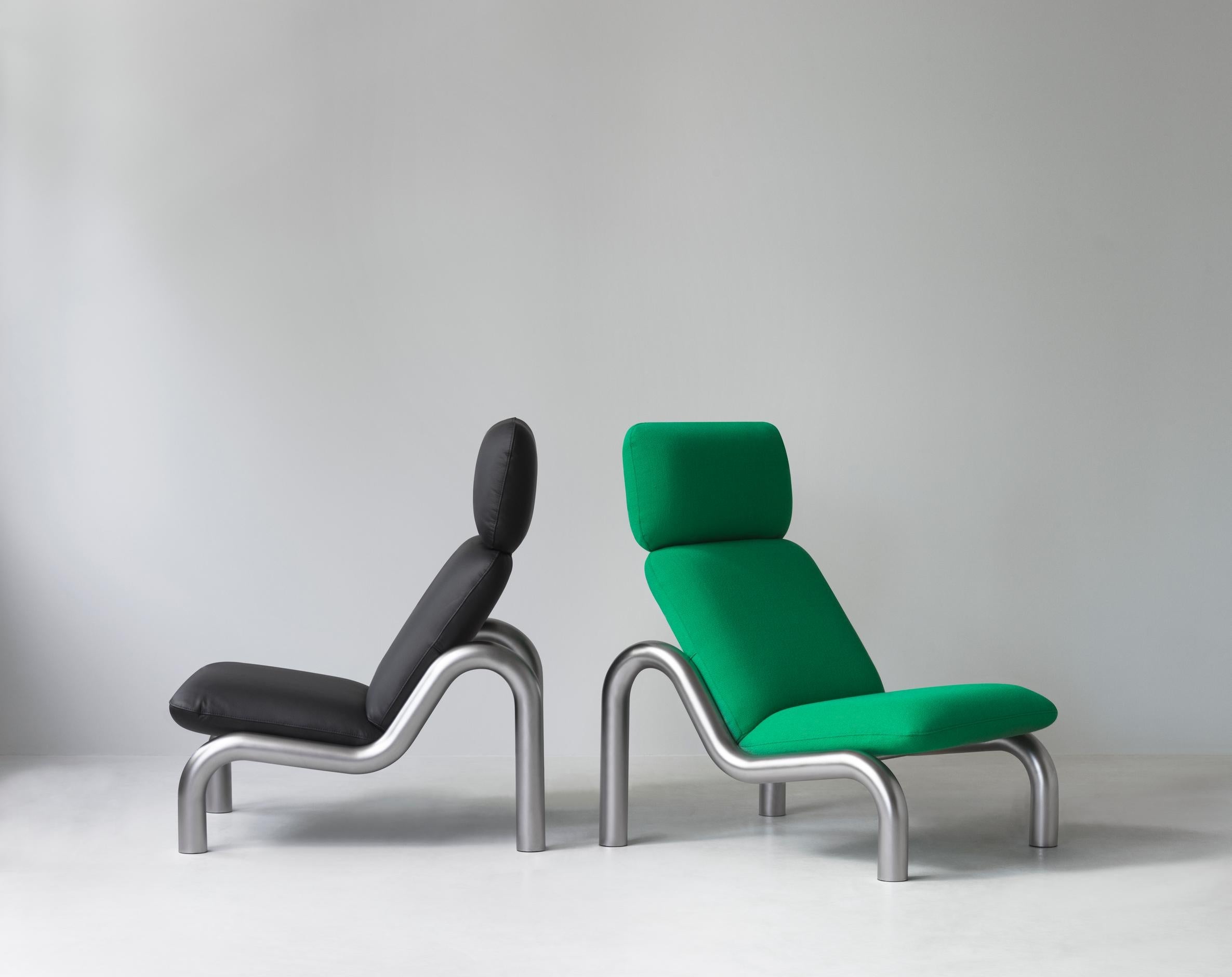 Upholstered armchair tube steel base