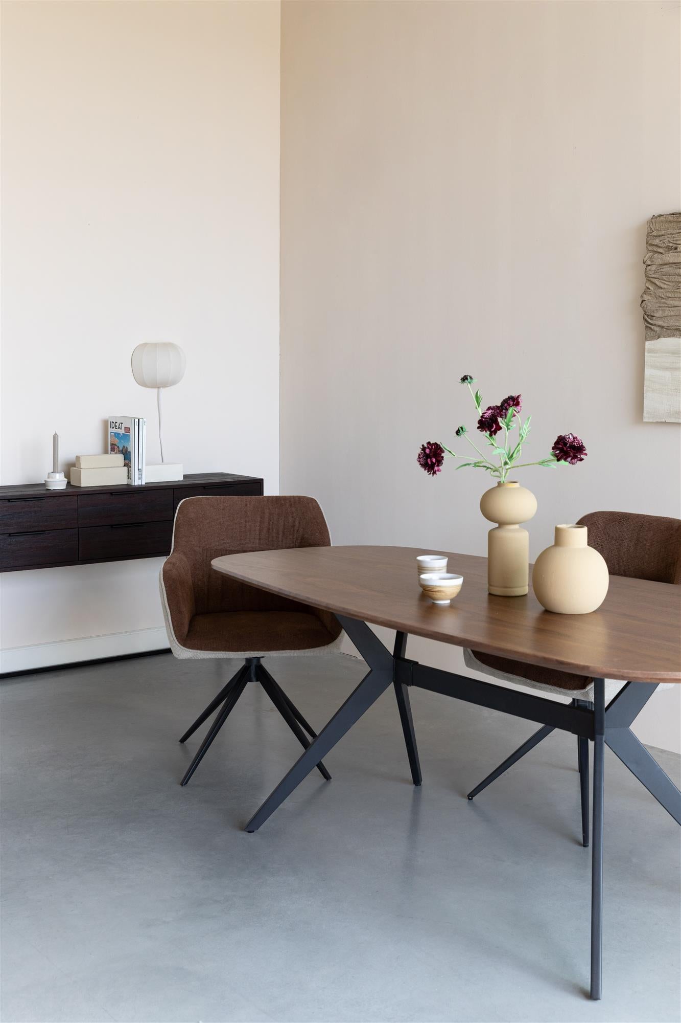 CHASE ORGANIC brown oval table with a black base