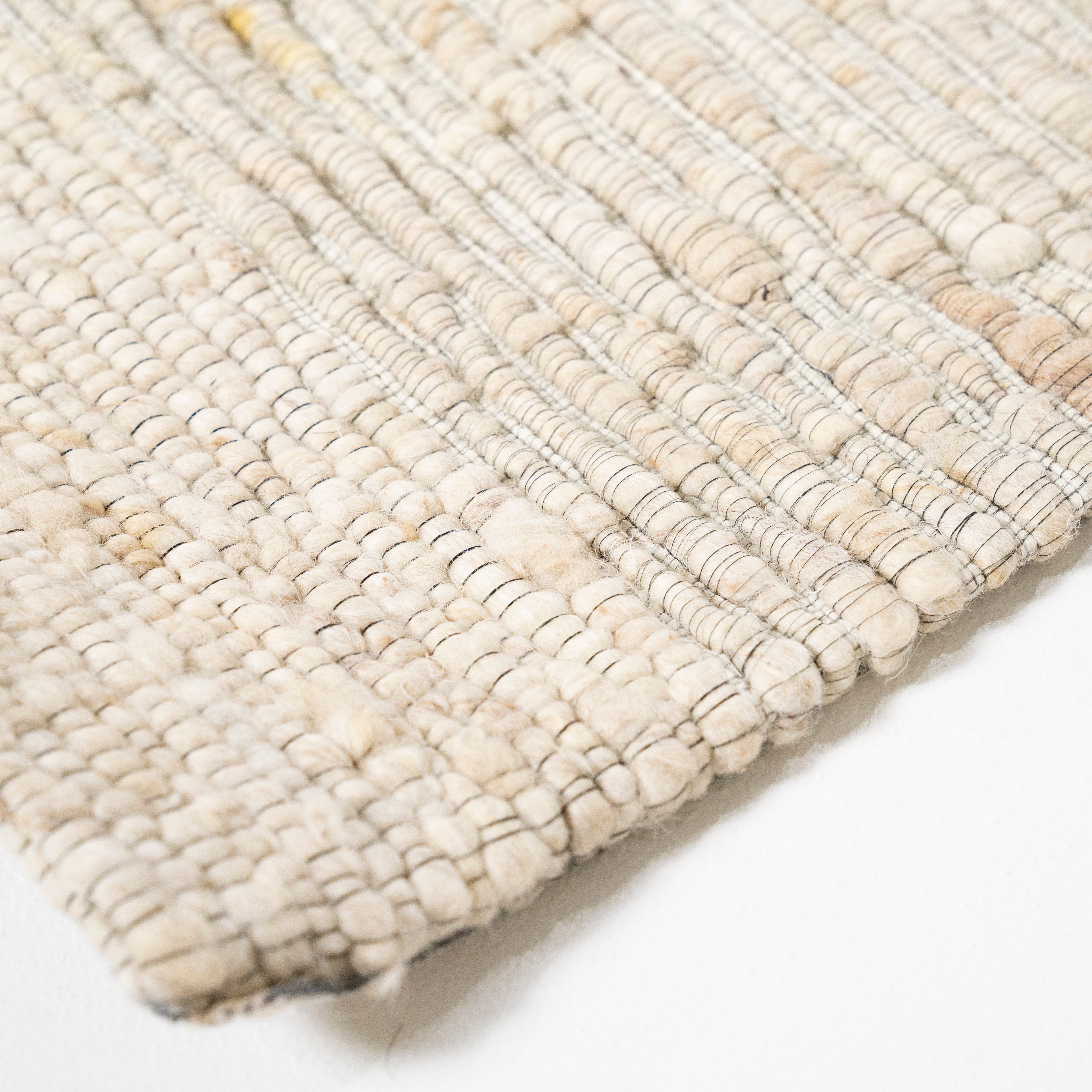 TAKARA cream rug