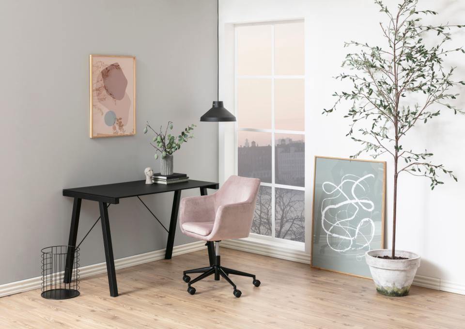 Nora's office chair dirty pink with a black base