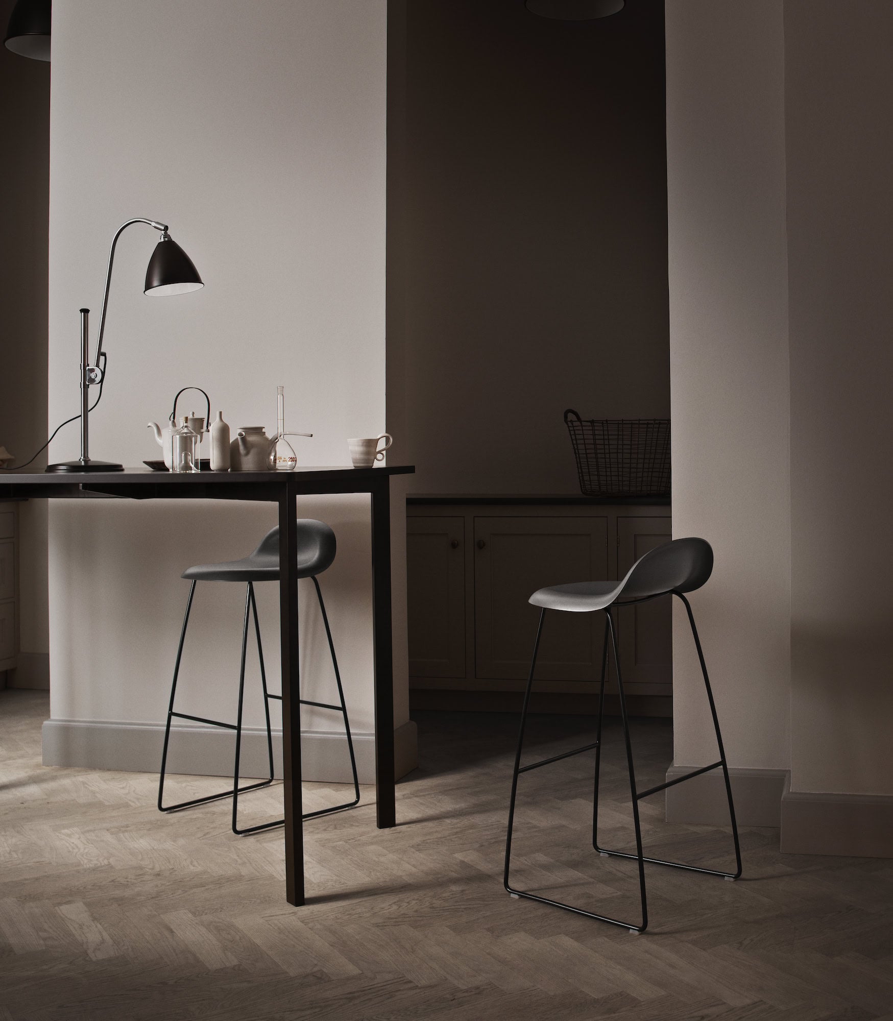 GUBI 3D stool with black seat and chrome base
