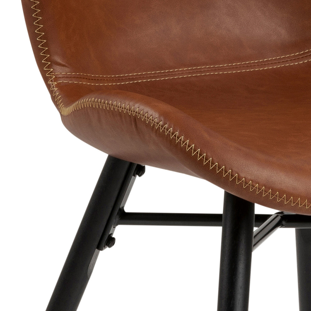 Batilda brandy leather chair with a black base