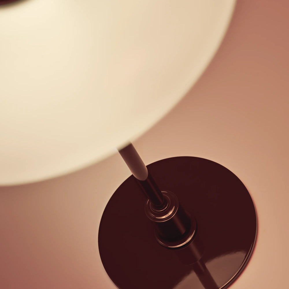 PH 2/1 table lamp in white with a burgundy base