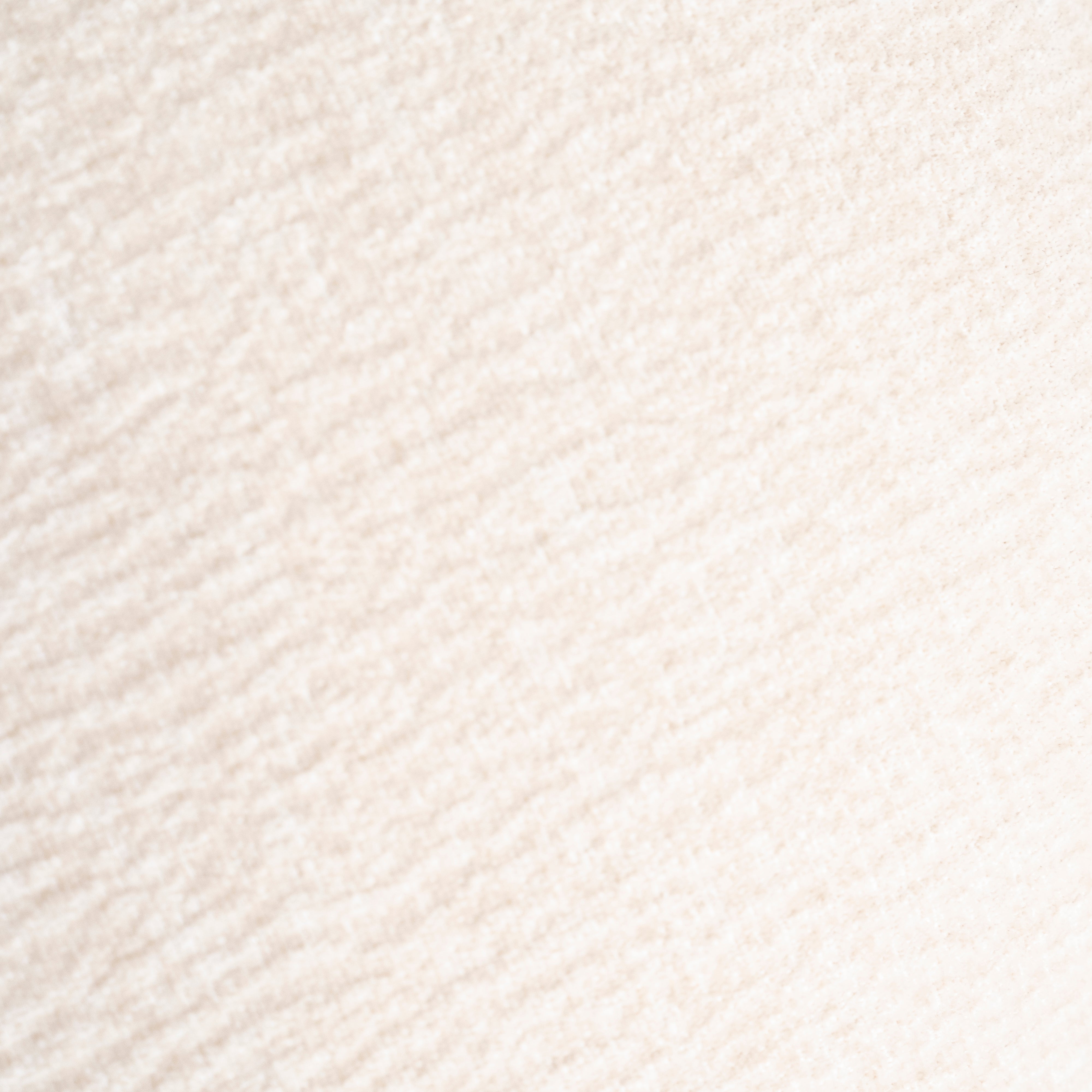 DAVID armchair in light beige with a black base