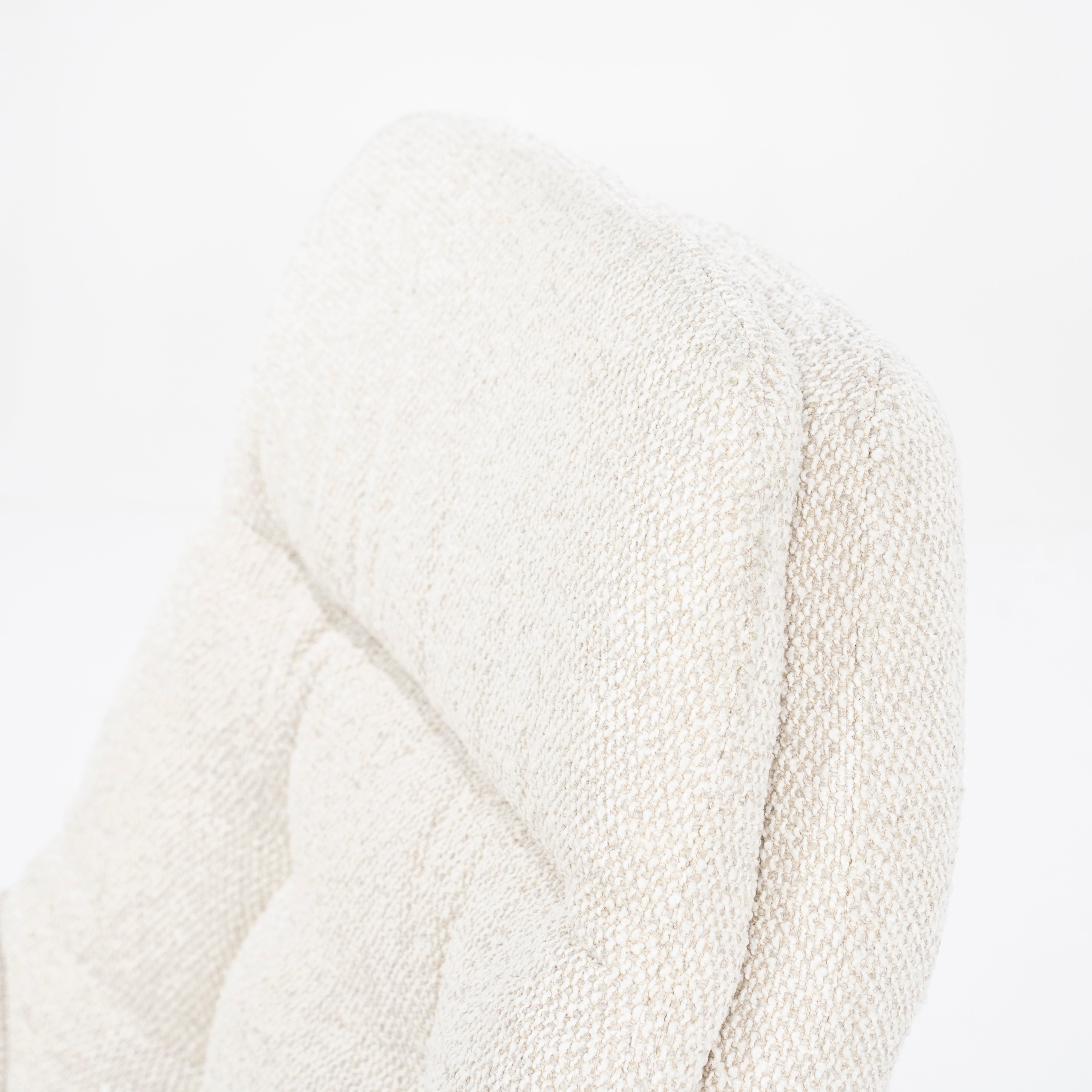 CALEB beige armchair with black base and footrest