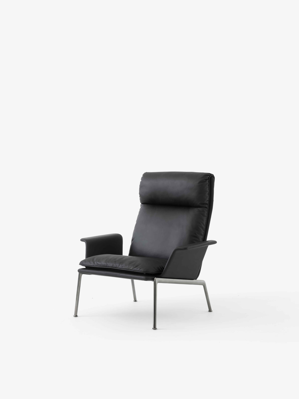 Upholstered MUNO LN17 armchair with a dark aluminum base