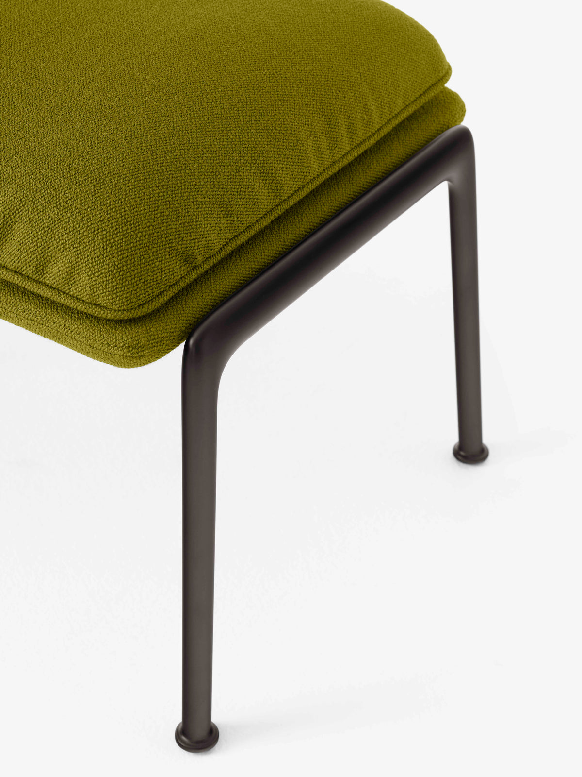 Upholstered MUNO LN20 footrest with a black base