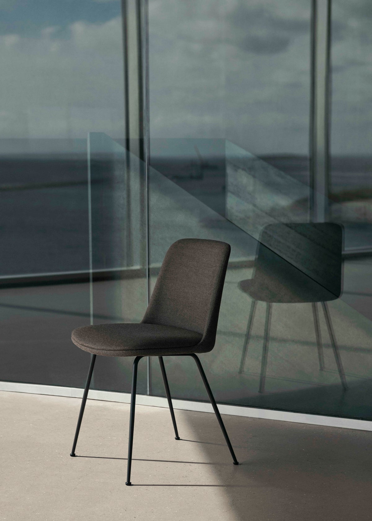 RELY HW9 upholstered chair with a chrome base