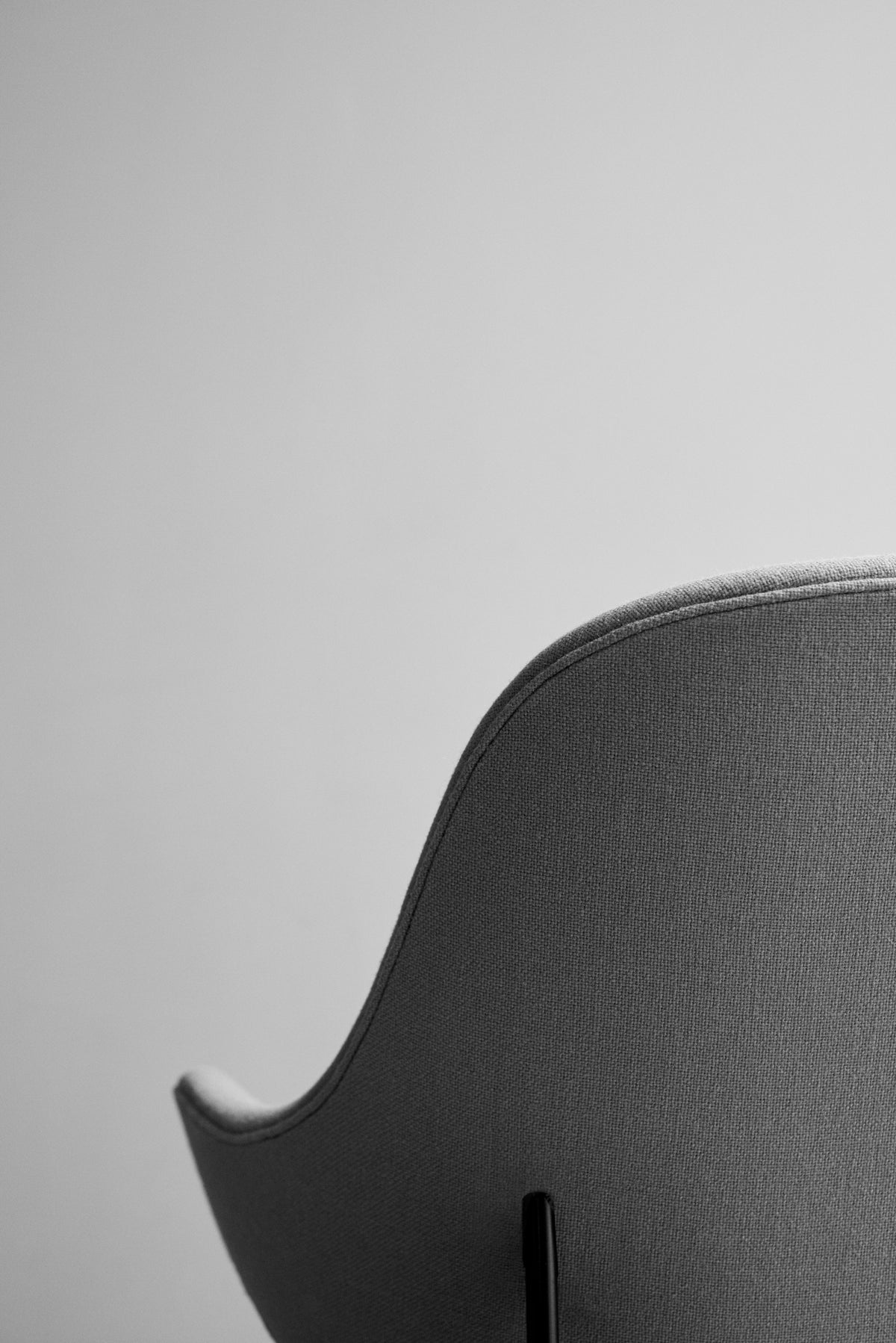 CATCH JH14 upholstered armchair with a black base