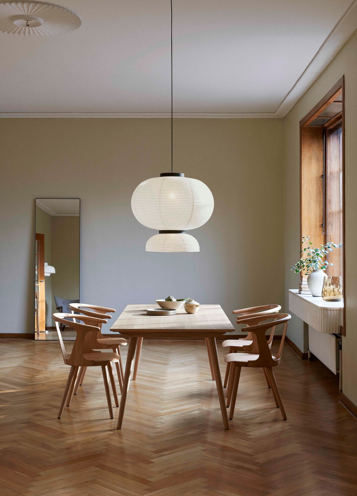 Round wall mirror AMORE with a brown frame
