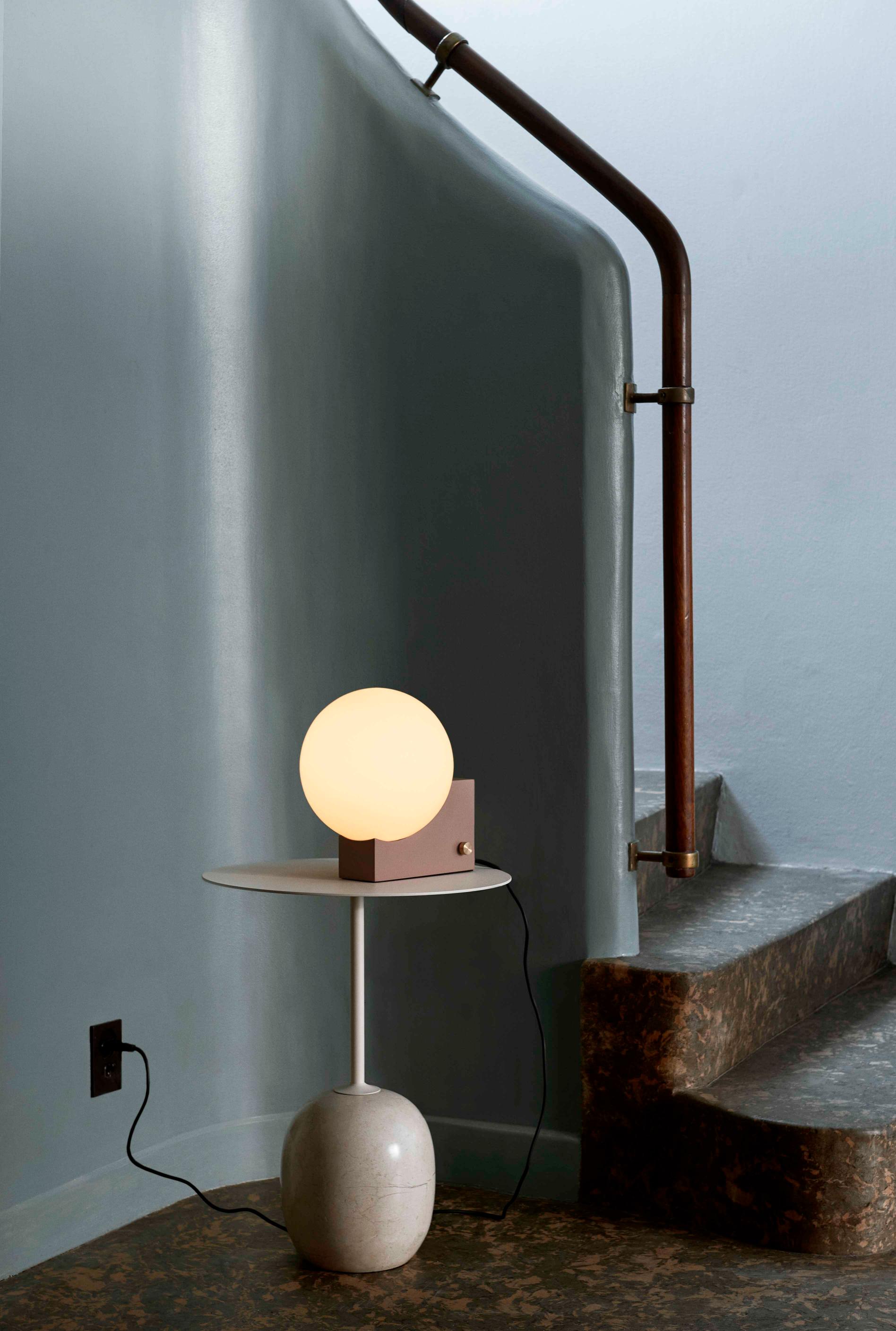 LATO side table with a cream top and beige marble base