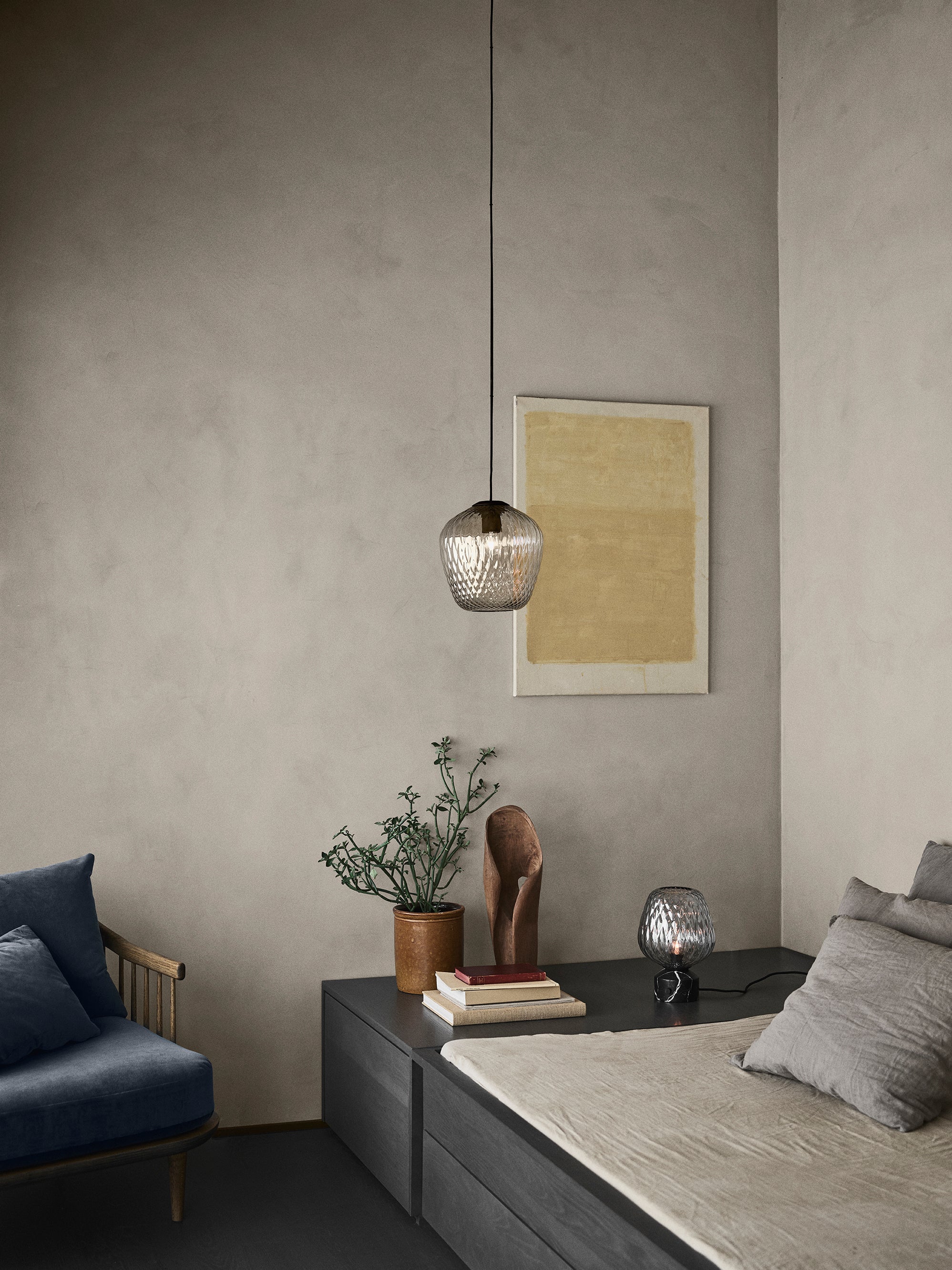 Blown pendant lamp with a glossy shade