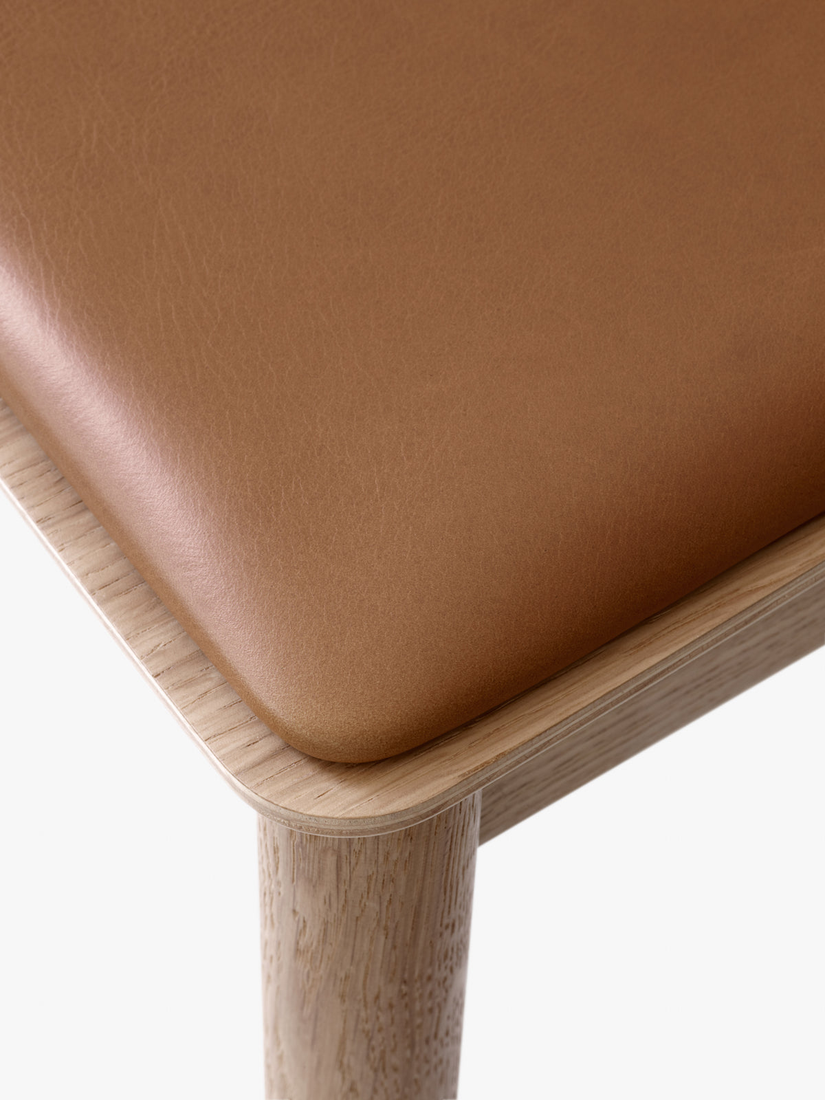 BETTY TK3 chair in lacquered oak with an upholstered seat