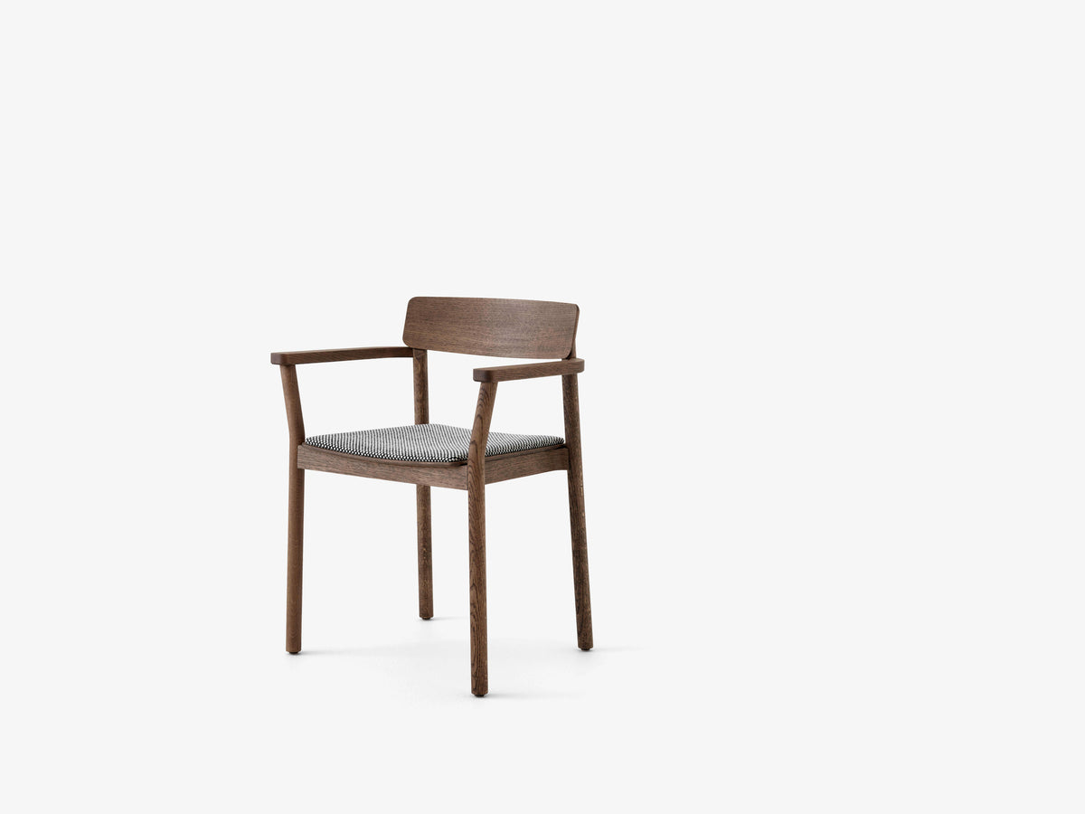 BETTY TK11 armchair in smoked oiled oak with an upholstered seat
