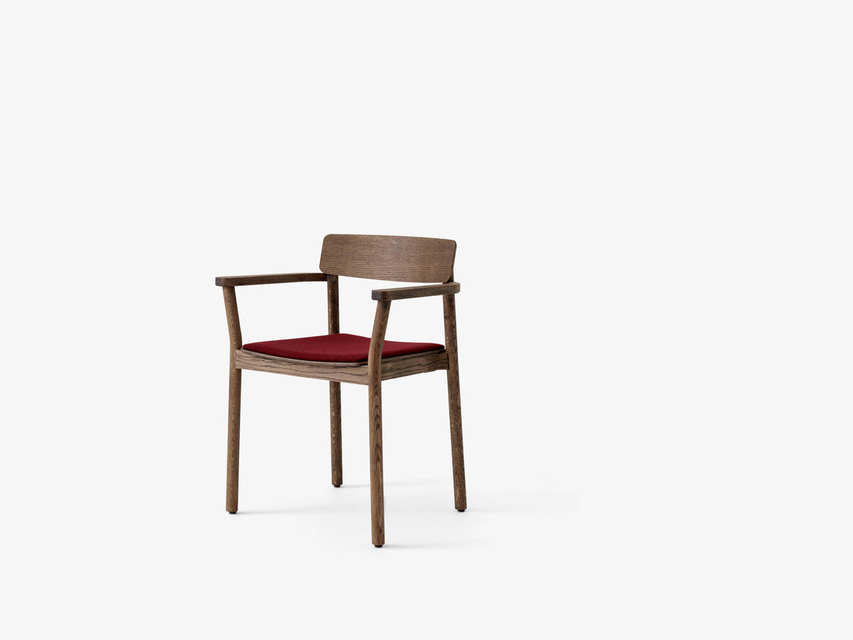 BETTY TK11 armchair in smoked oiled oak with an upholstered seat