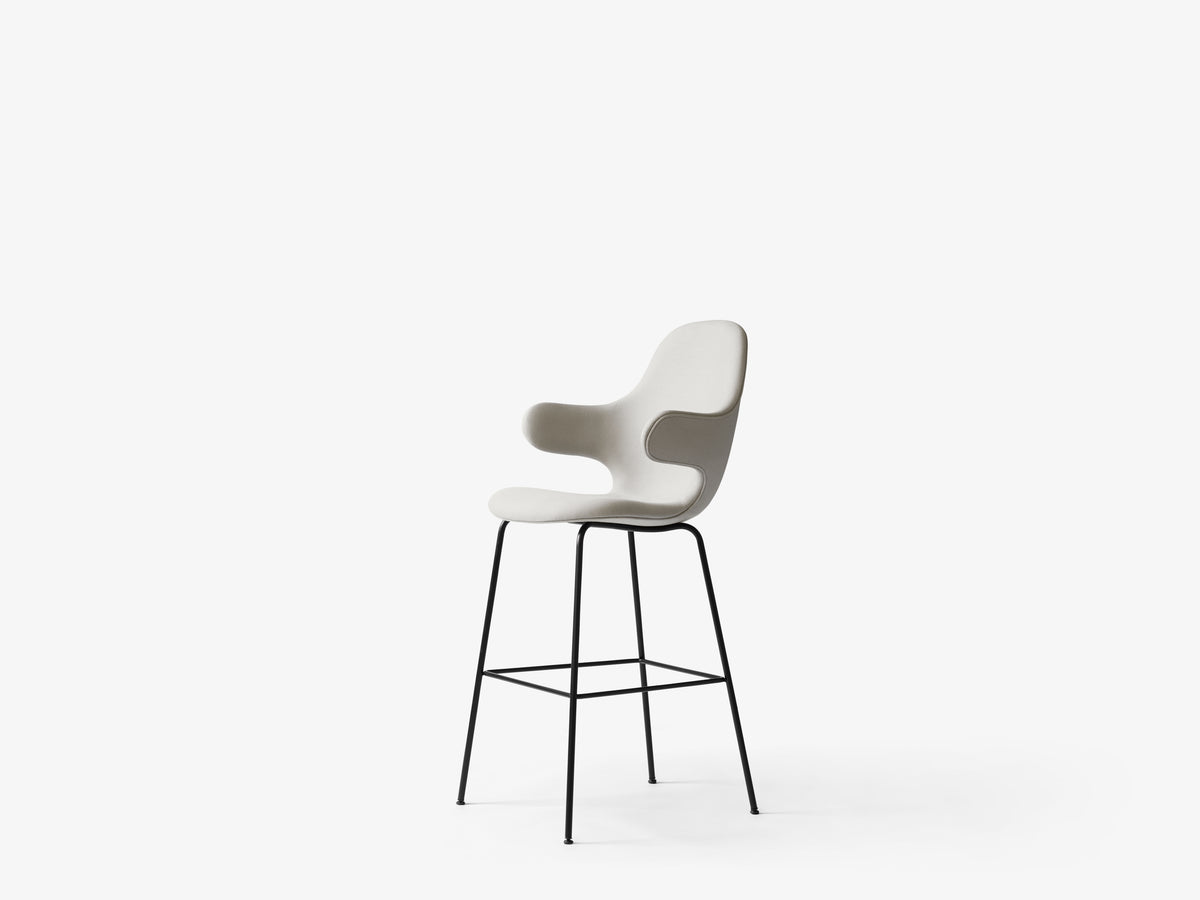 CATCH upholstered stool with a black base