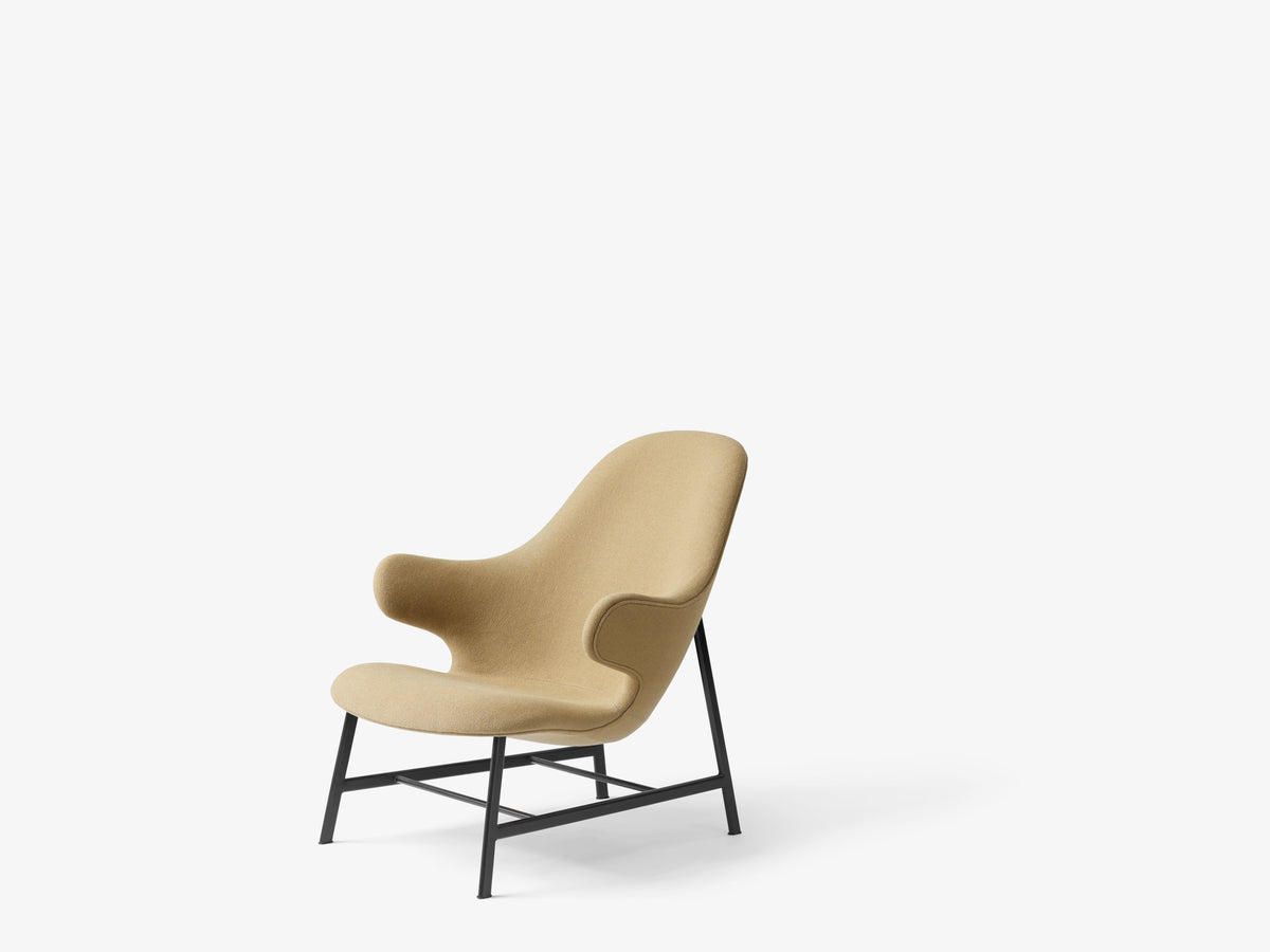 CATCH JH13 upholstered armchair with a black base
