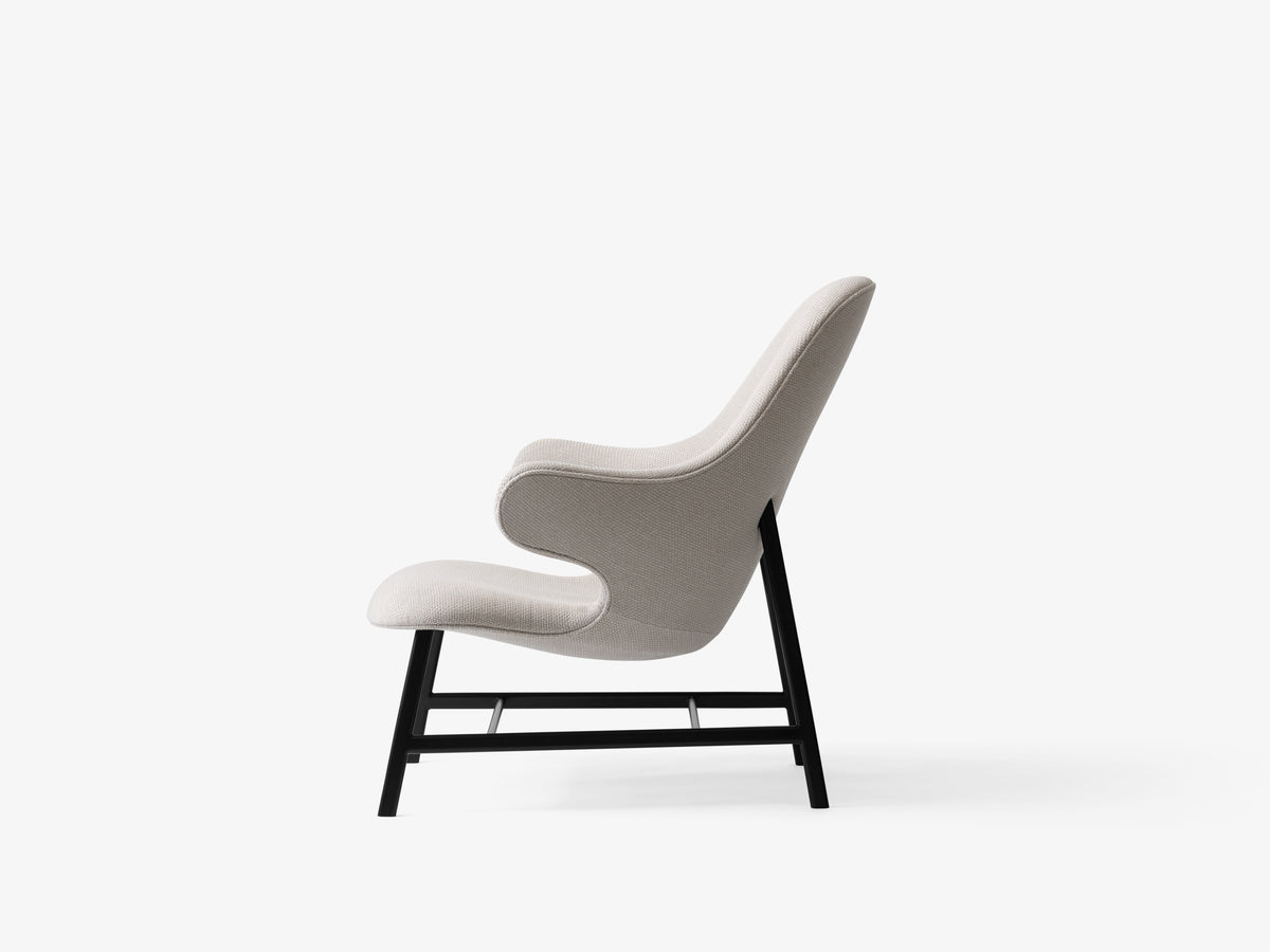 CATCH JH13 upholstered armchair with a black base