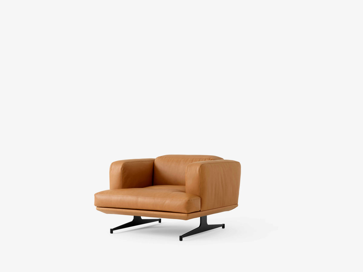 INLAND AV21 upholstered armchair with a black base