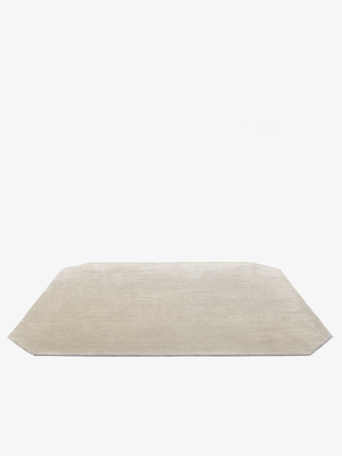 THE MOOR square rug with rounded corners in beige
