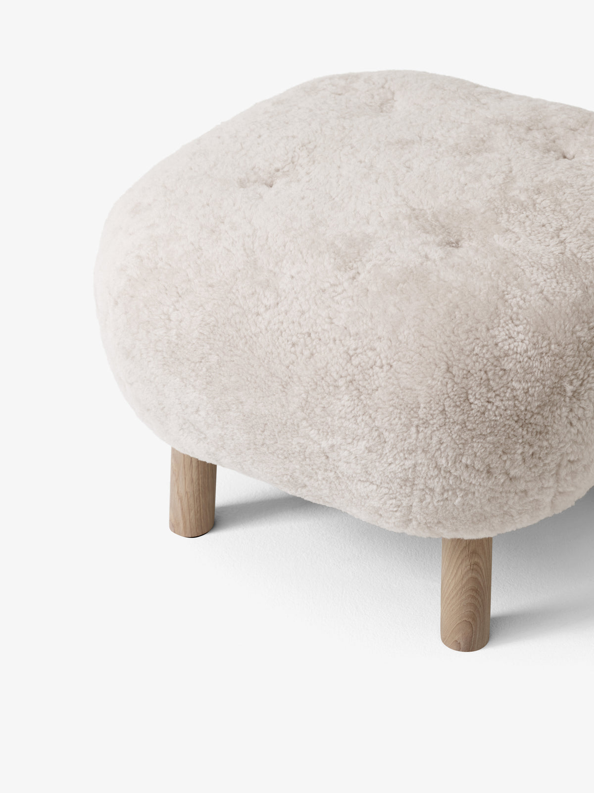 Upholstered footrest ATD1 with an oak base