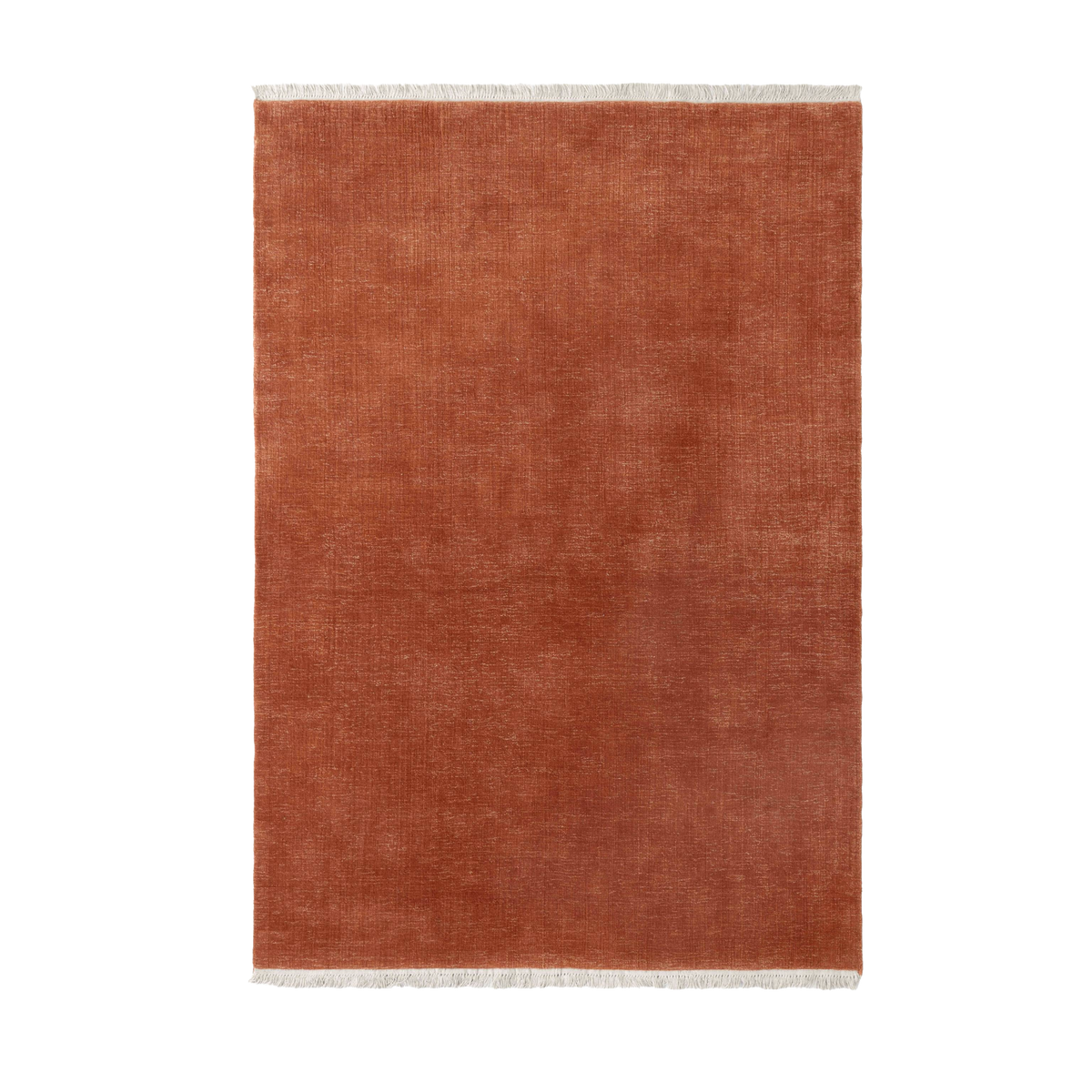 THE MOOR fringed rug in muted red