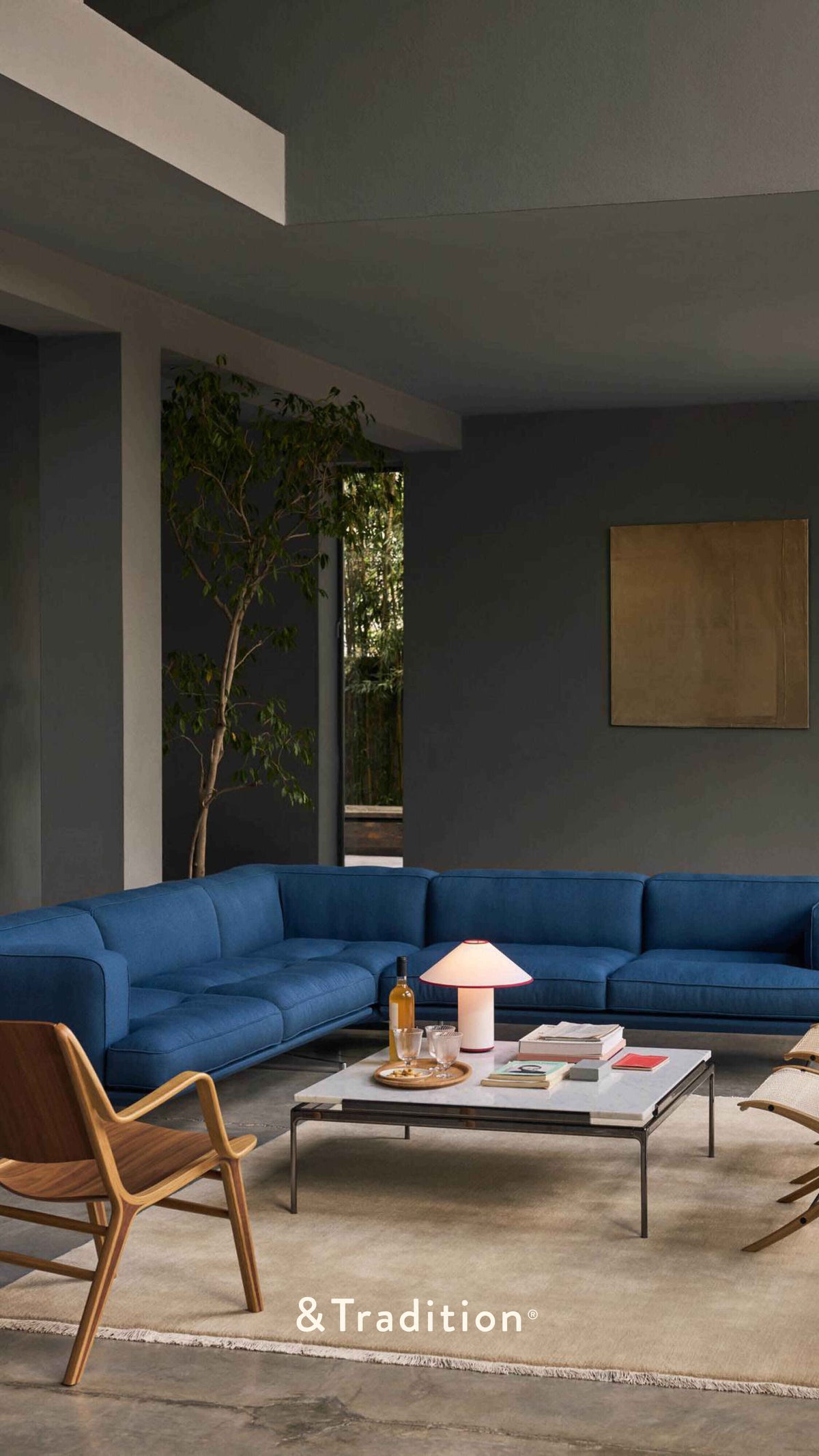 Symmetrical sofa INLAND AV41 upholstered with an aluminum base