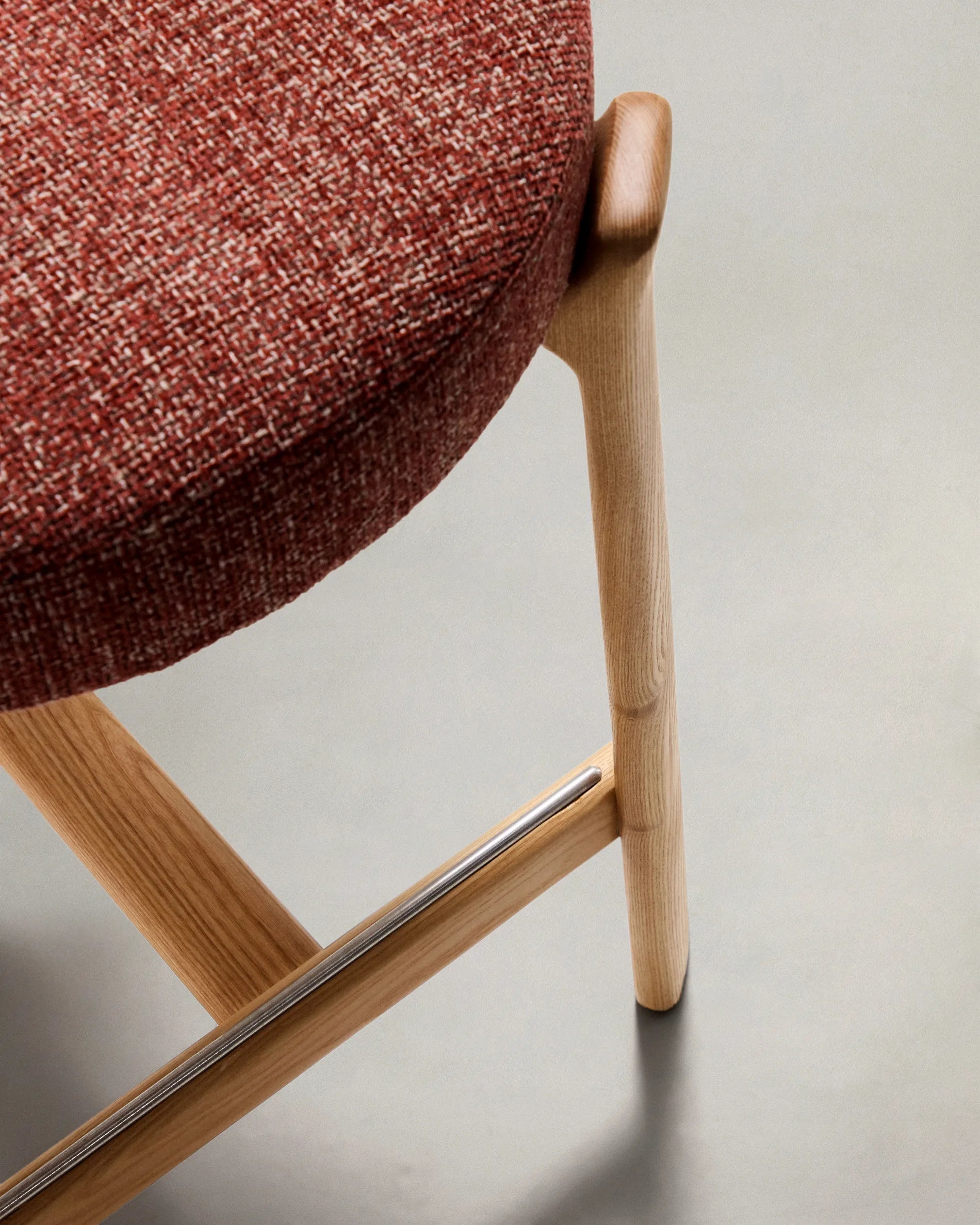 GRANITE red chenille stool with an ash base
