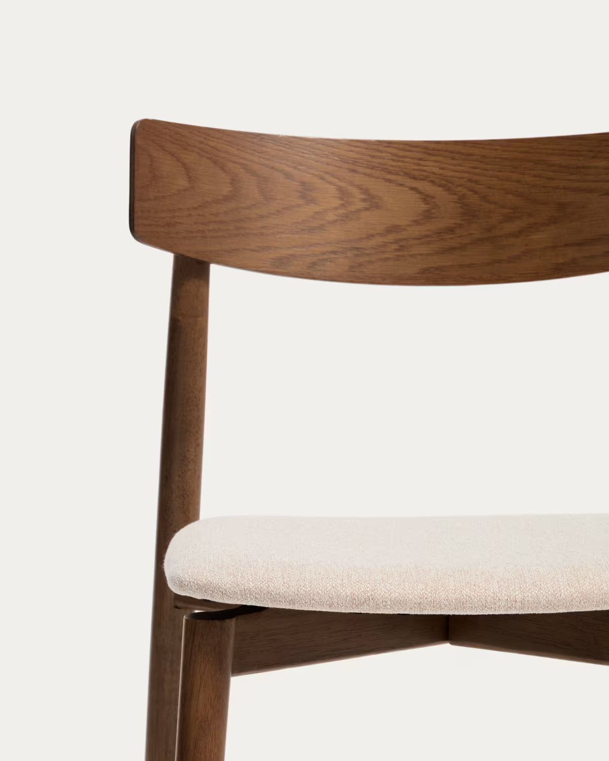 EVERA chair in beige chenille with a dark oak veneered base.