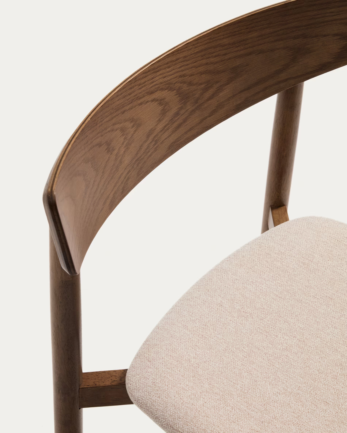 EVERA chair in beige chenille with a dark oak veneered base.
