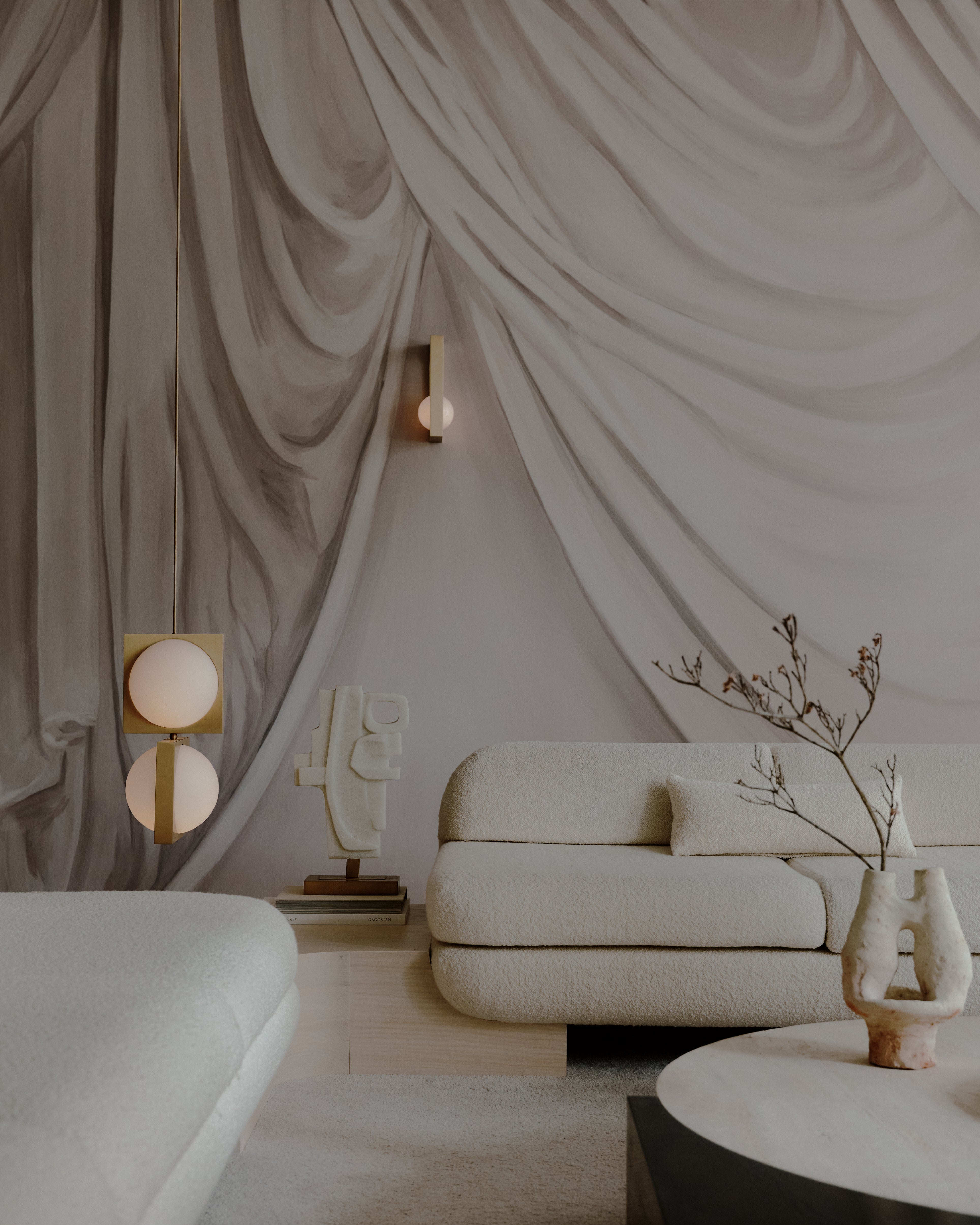 SOLSTICE wall lamp with an opal shade and blackened brass.