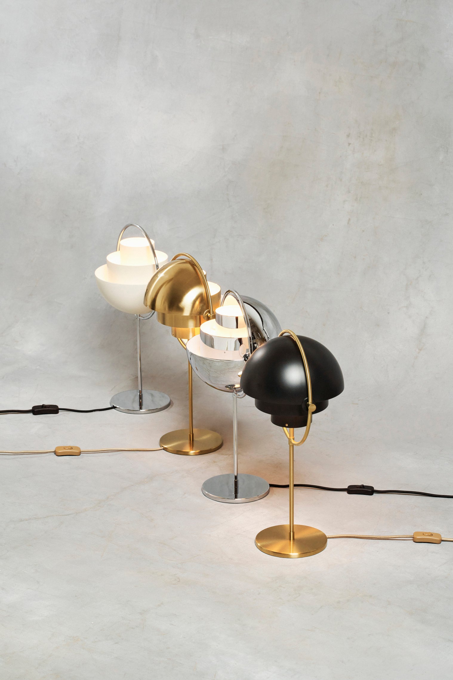 MULTI-LITE table lamp in black with a chrome base