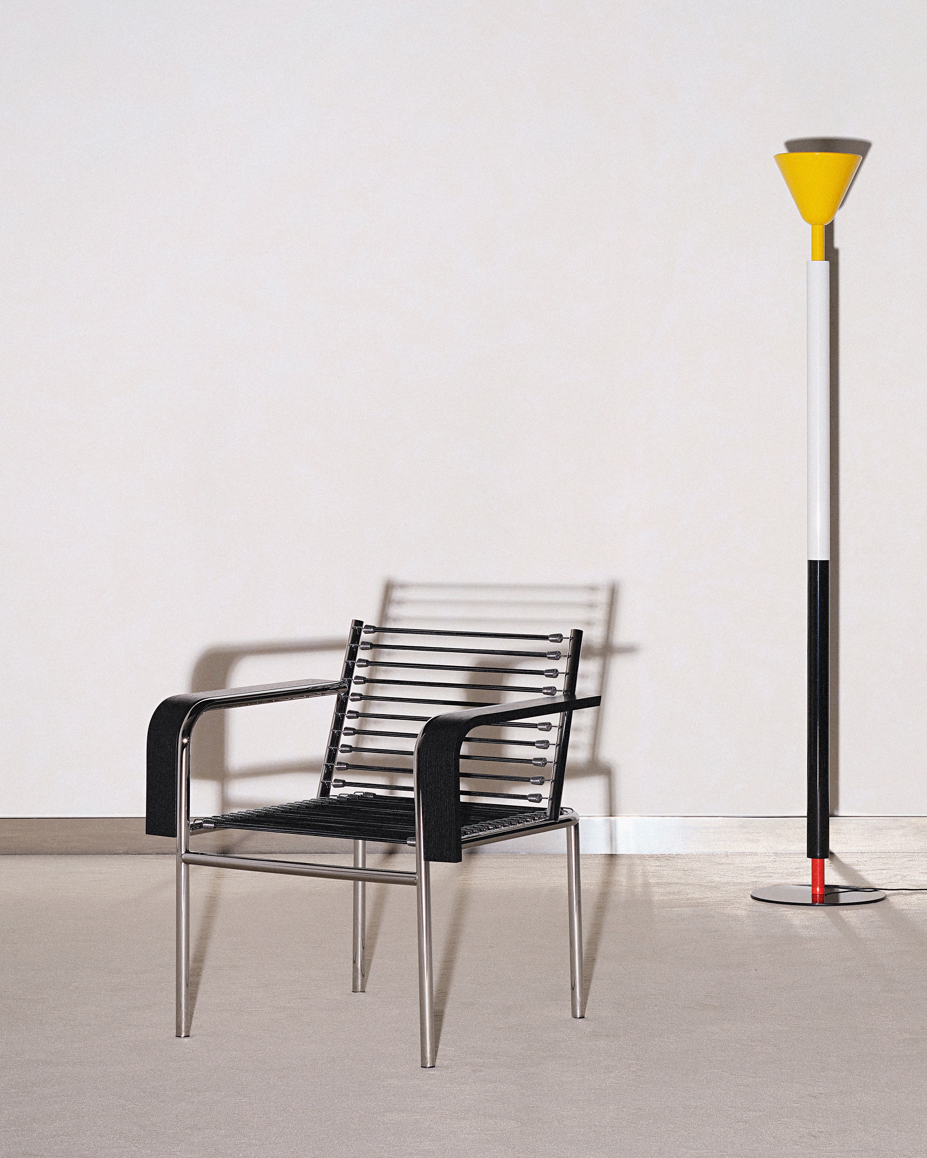 SANDOWS Armchair in Black with Steel Base
