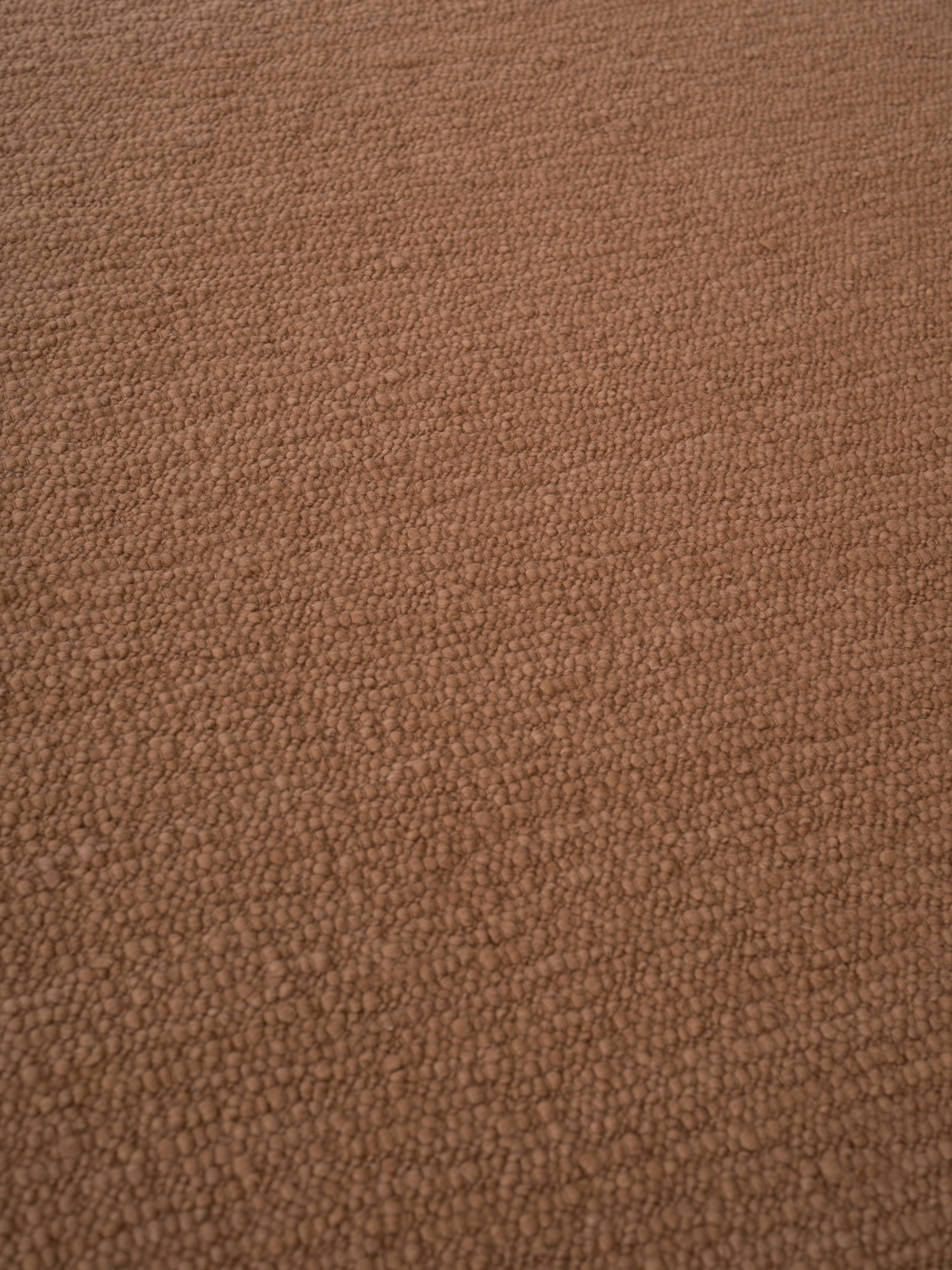 Teppich PEBBLED POEM ziegelrot