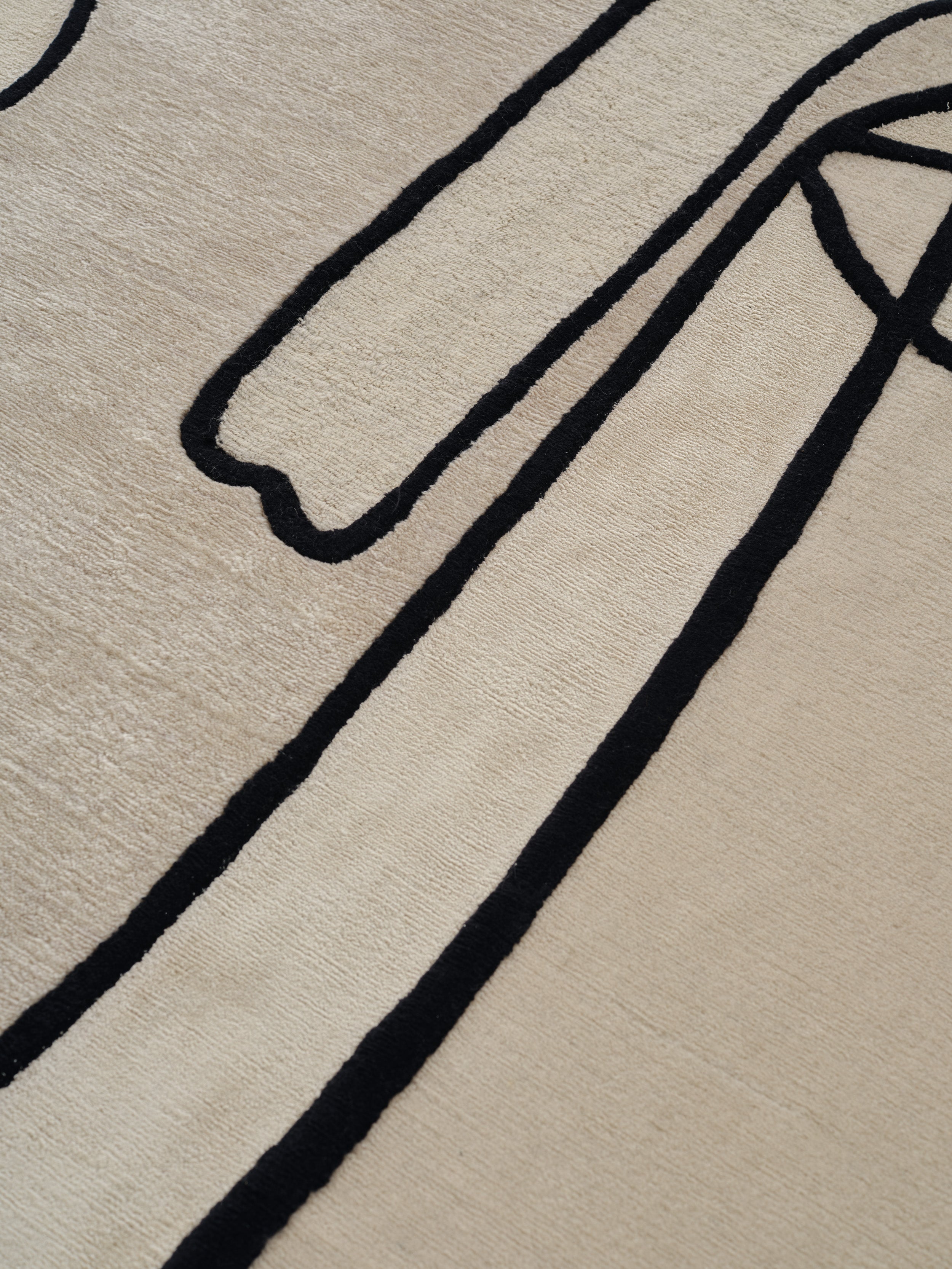 Teppich SLANTED SELF beige mit Schwarz