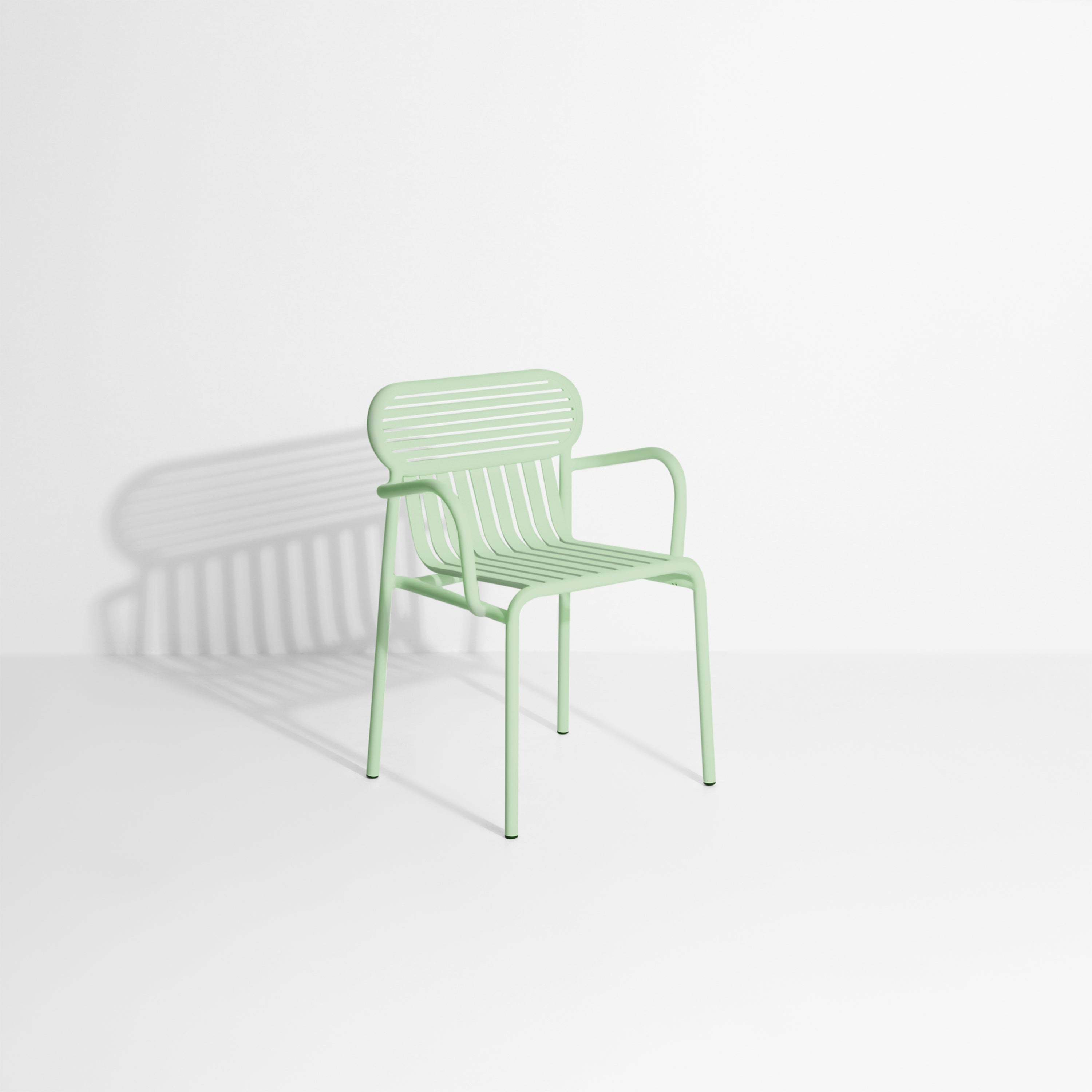 WEEK-END pastel green garden chair with armrests