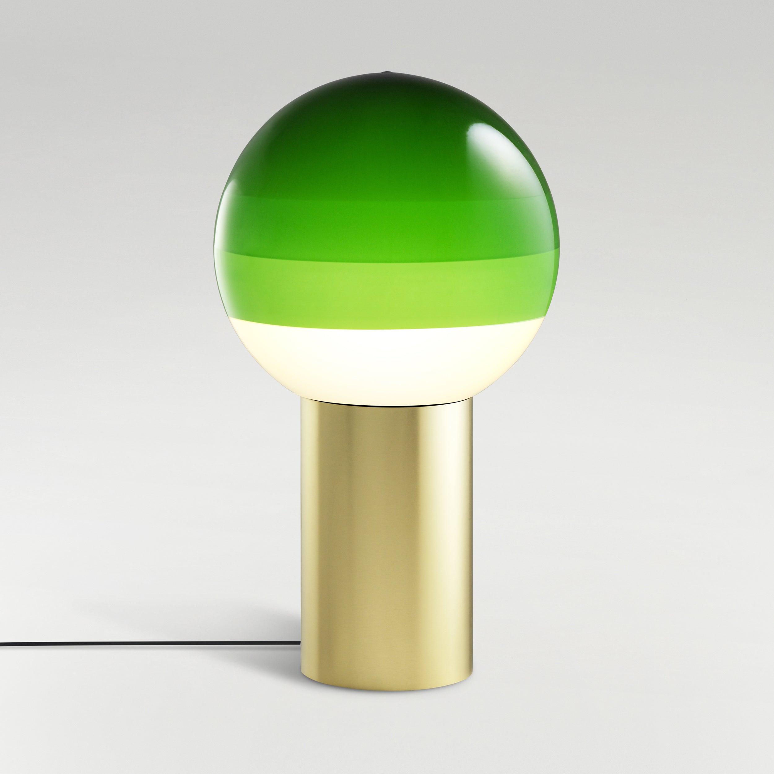 DIPPING green table lamp with a gold base