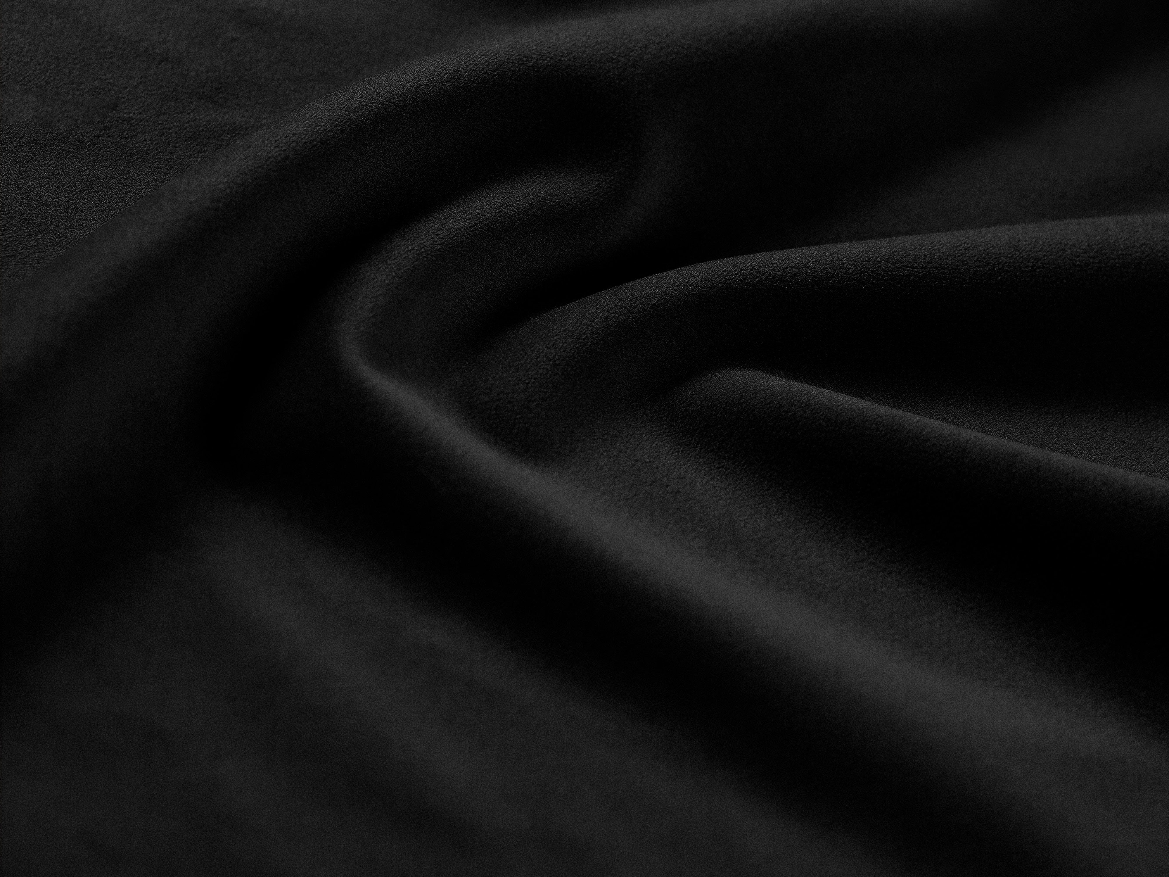 Left-facing velvet corner sofa JODIE in black, designed for three people.