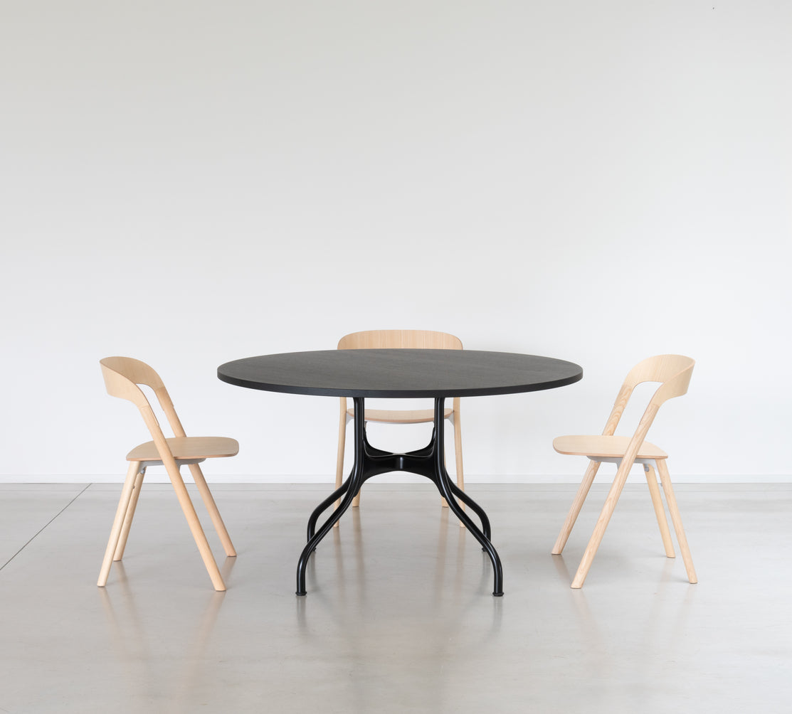 Round table MILA with a white steel base