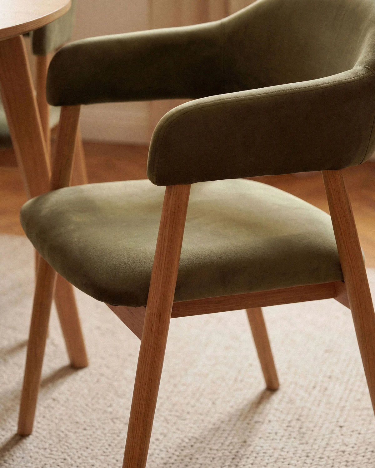 ADRA Chair in dark gray chenille with a black base