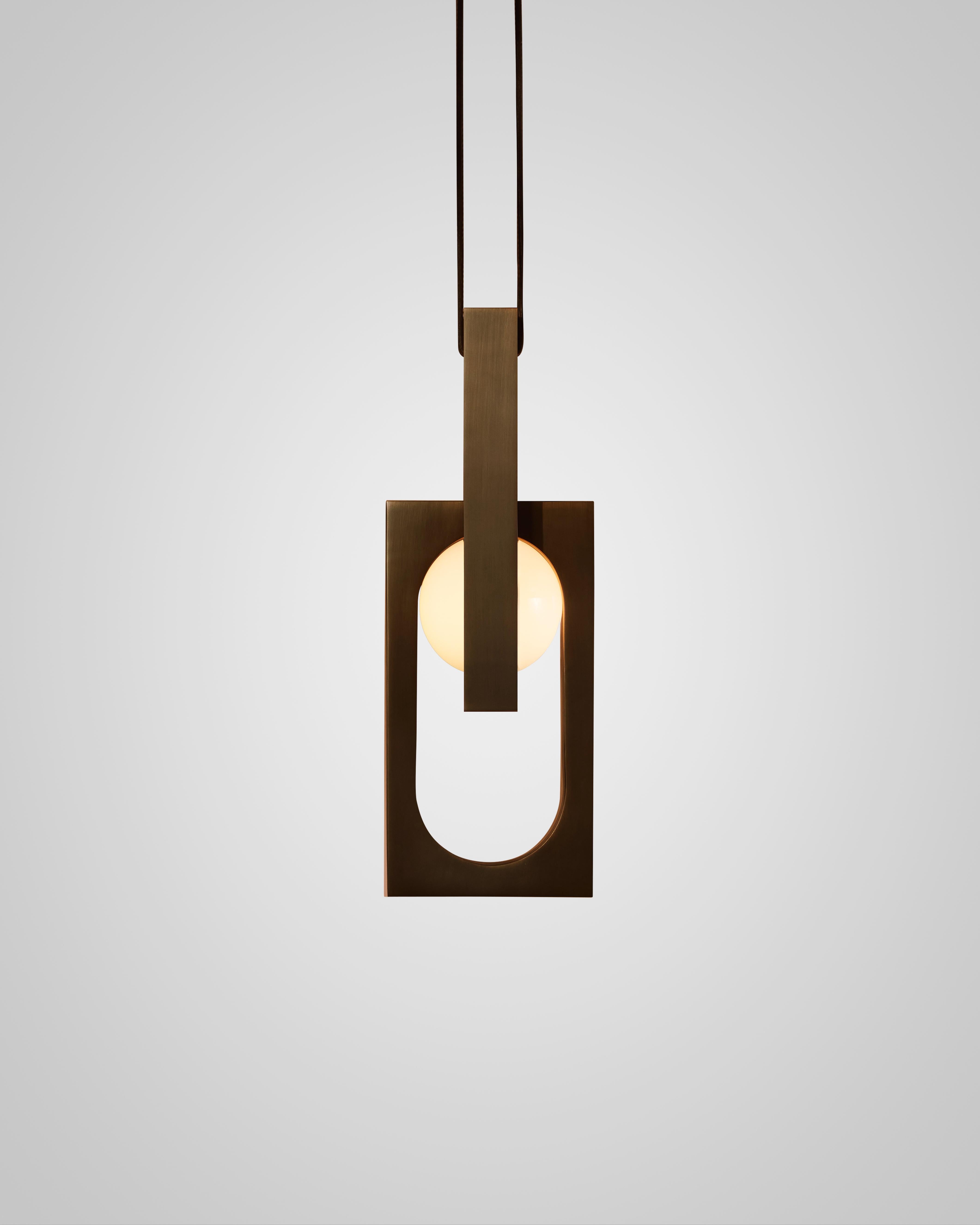 MYTHOS DUO pendant lamp with an opal shade and blackened brass.
