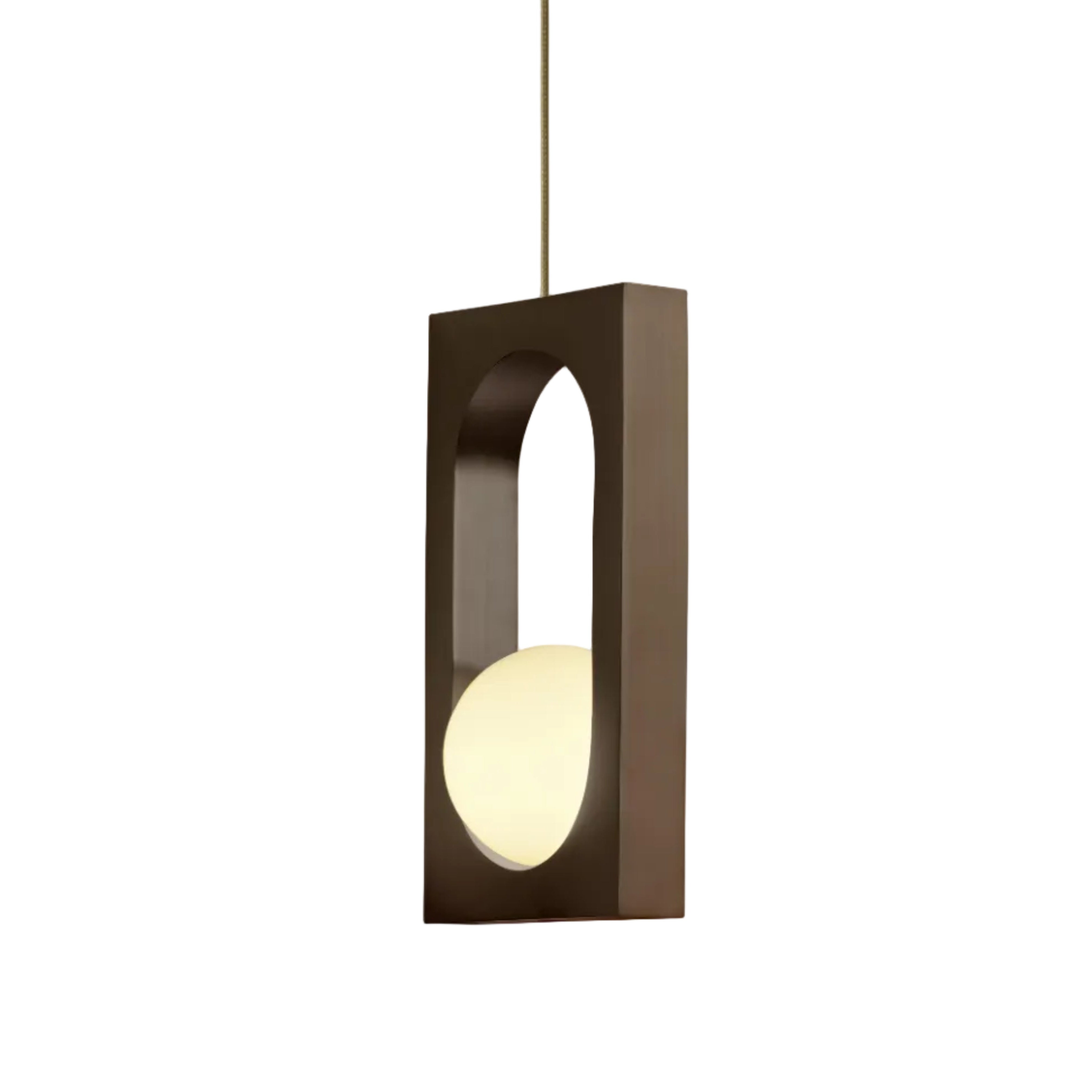 MYTHOS pendant lamp with an opal shade and blackened brass.